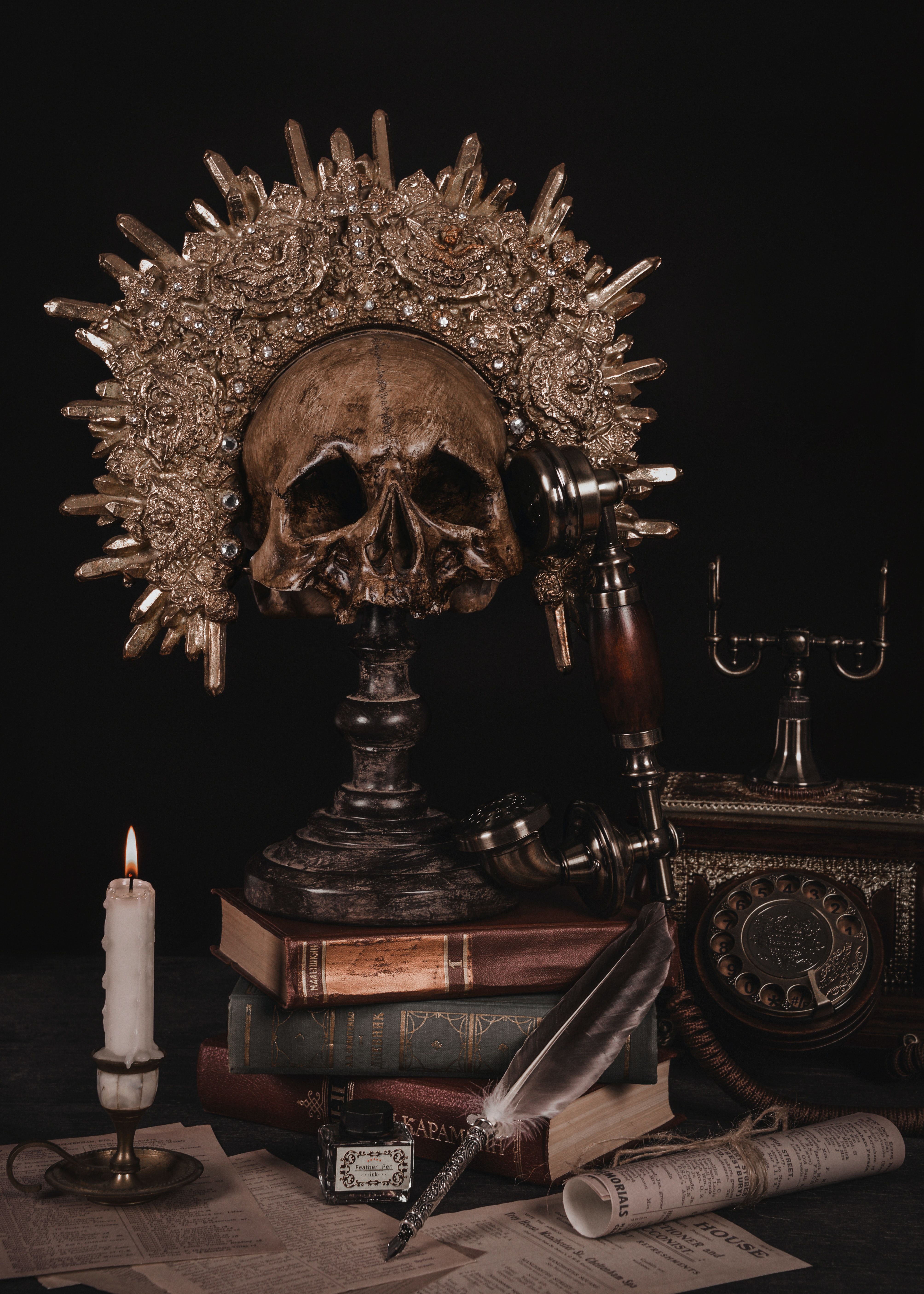 A skull and some old books - Royalcore
