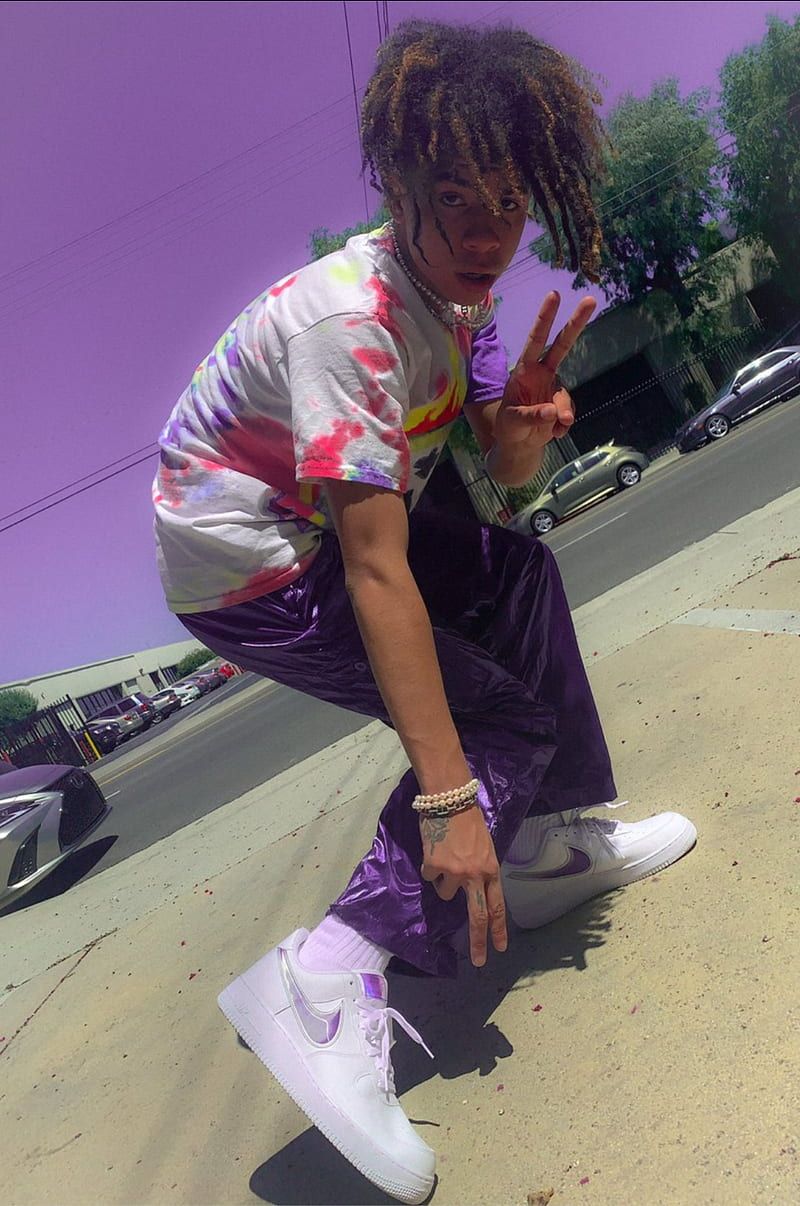 Lil pump wearing a tie die shirt and white air force 1s - Dior
