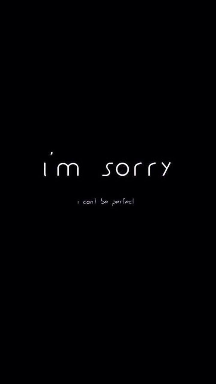 The dark background with a white text that says i'm sorry - Depression