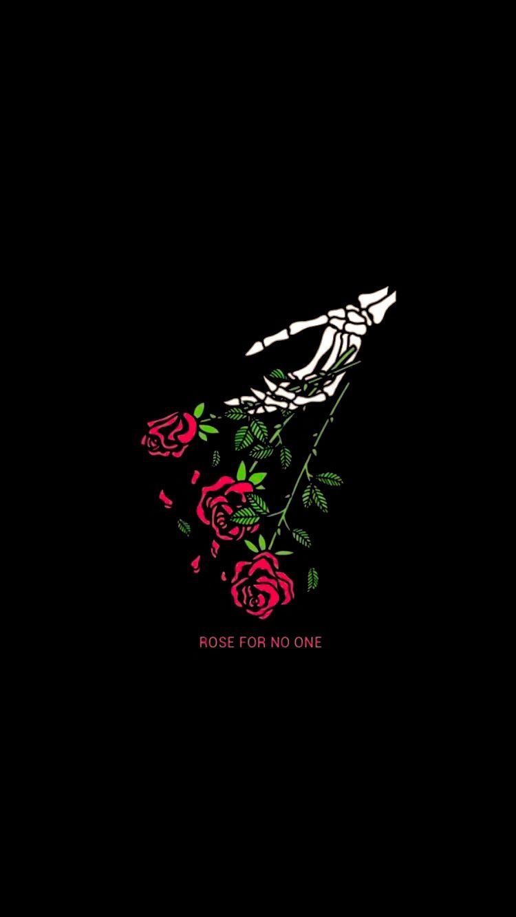 A skeleton hand holding roses on black background - Depression
