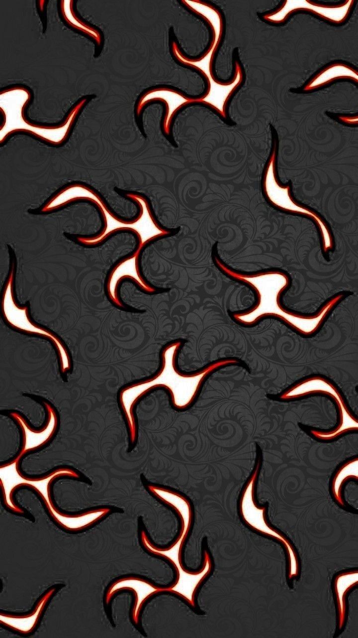 A pattern of flames on black background - Flames