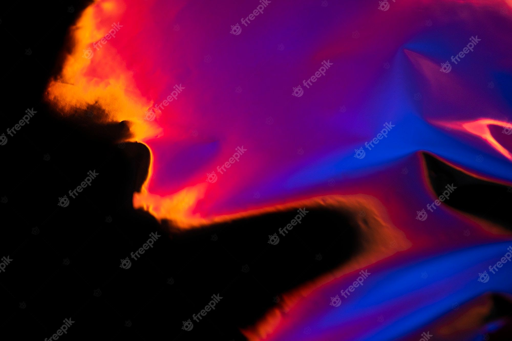 An abstract image of a colorful, flowing liquid - Flames