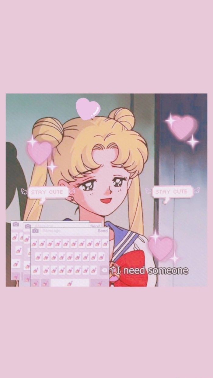 A cartoon character is sitting in front of her computer - Sailor Moon