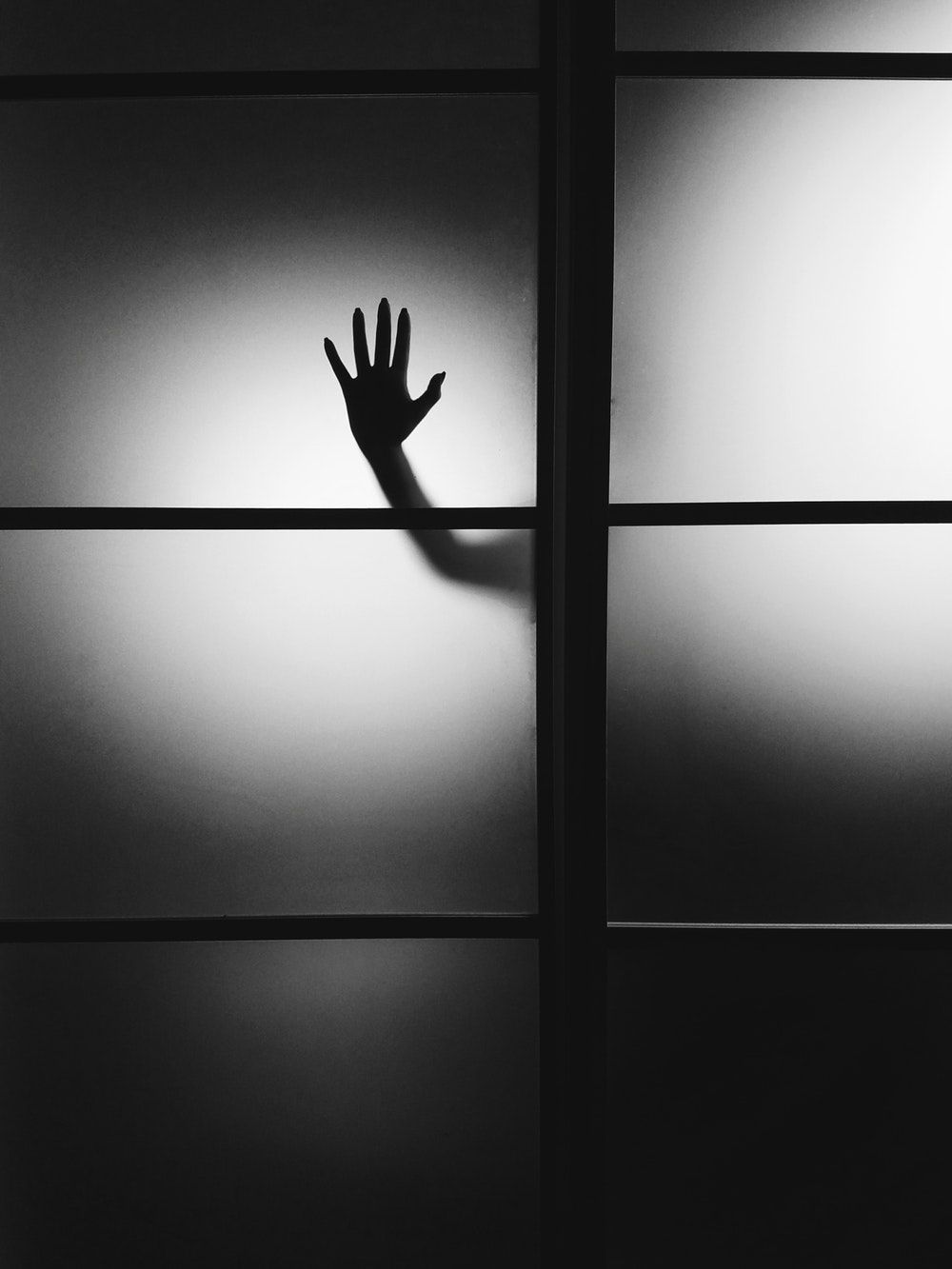 A hand reaching out of the dark - Horror, shadow