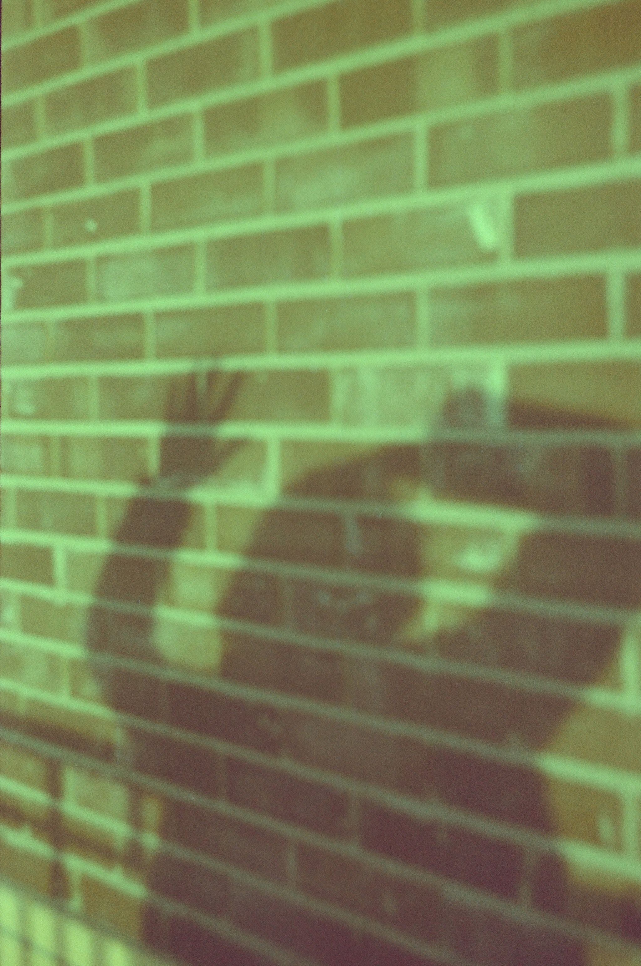 A shadow of someone is on the wall - Shadow