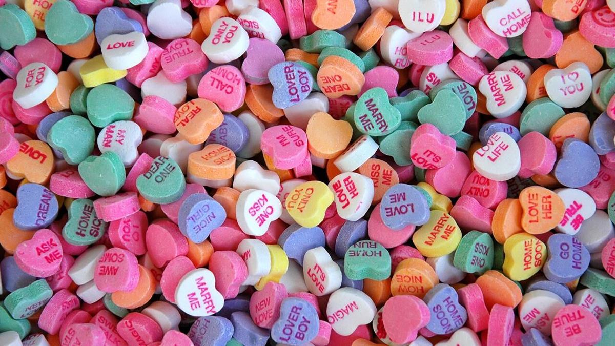 A pile of colorful conversation hearts - Candy