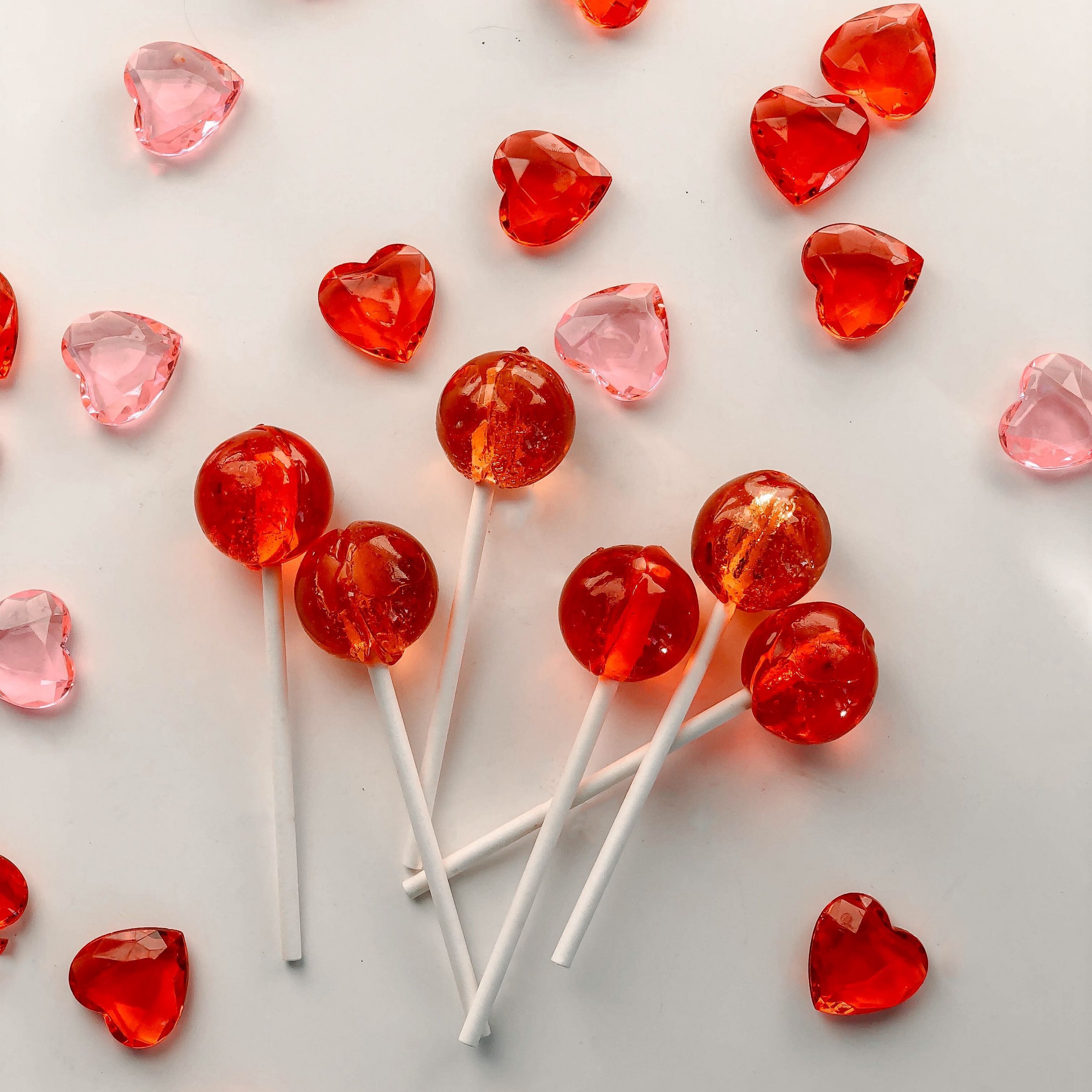 A group of lollipops with hearts on them - Candy