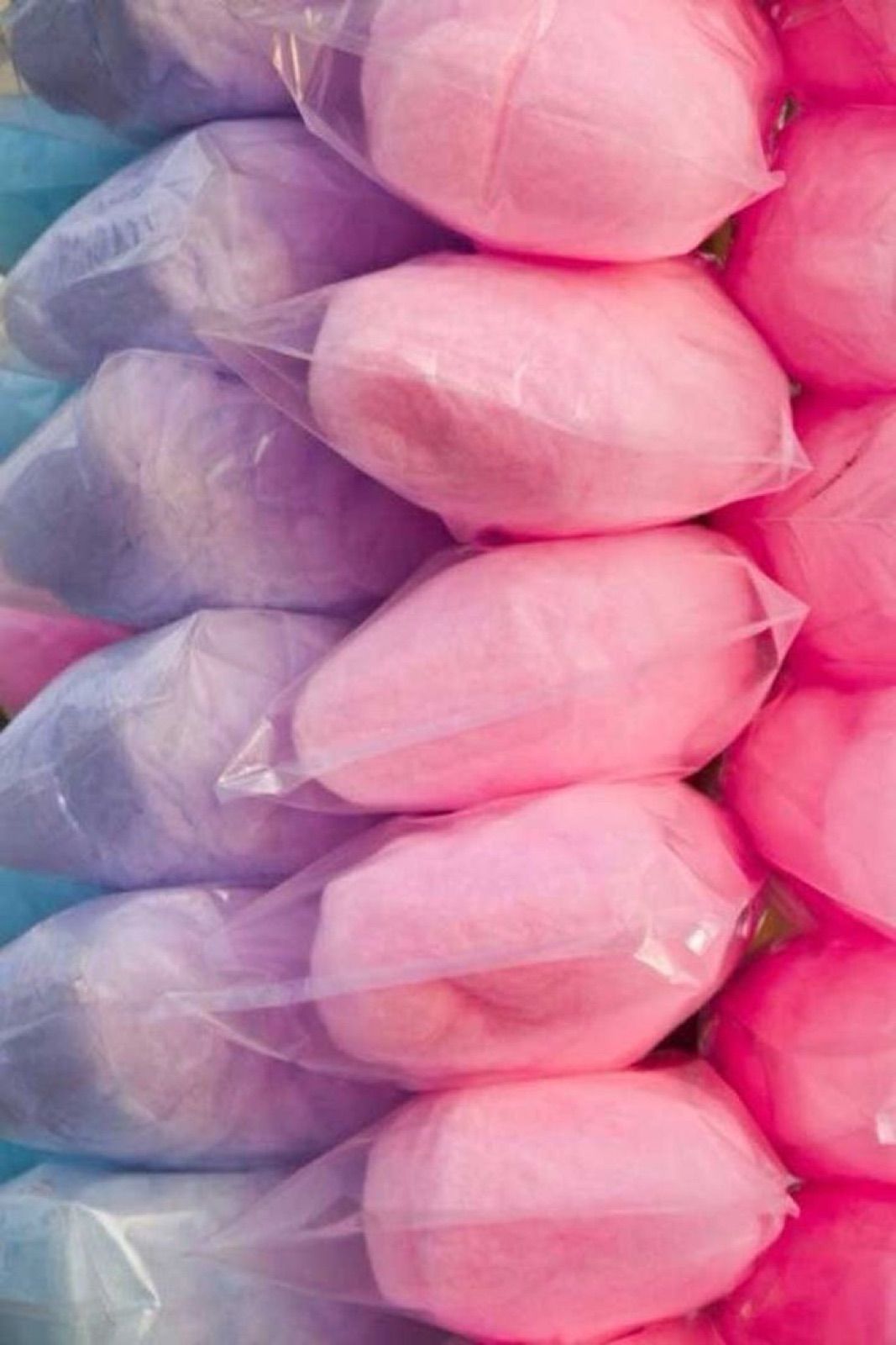 A pile of cotton candy in different colors - Candy