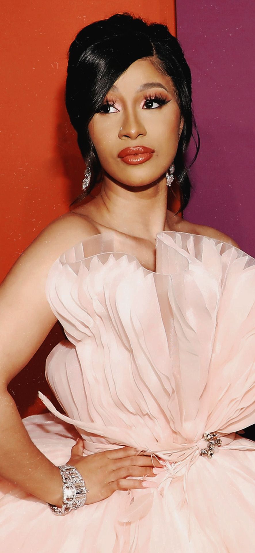 Cardi B in a pink dress and diamond jewelry - Cardi B