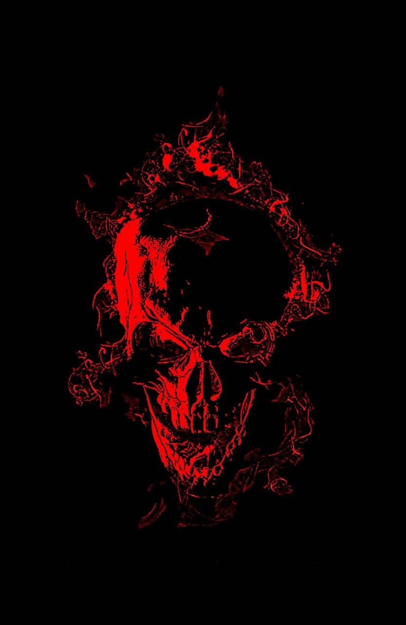 The skull is red and has a flame in it - Skull