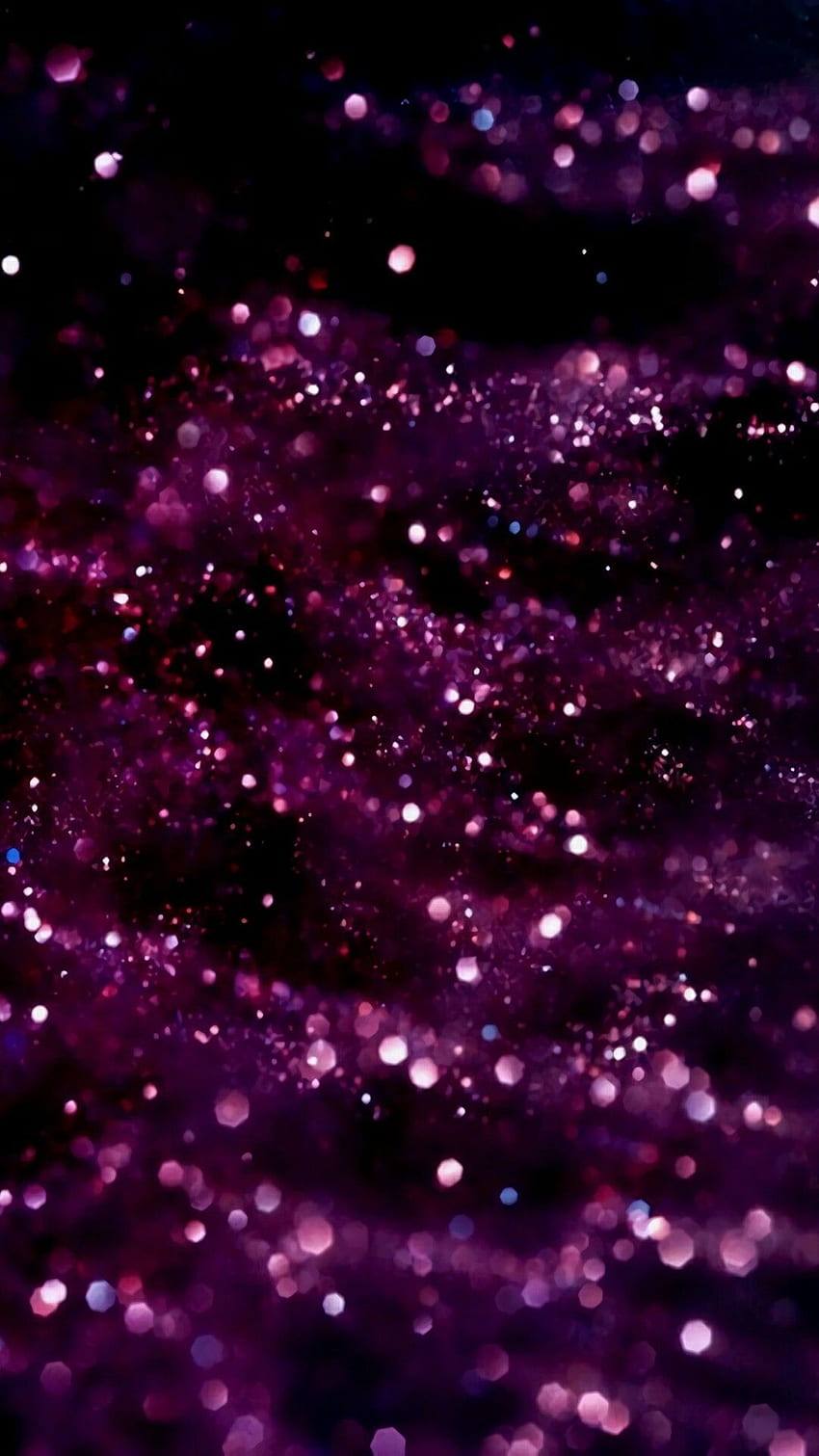 Purple bokeh lights on a black background - Dark purple