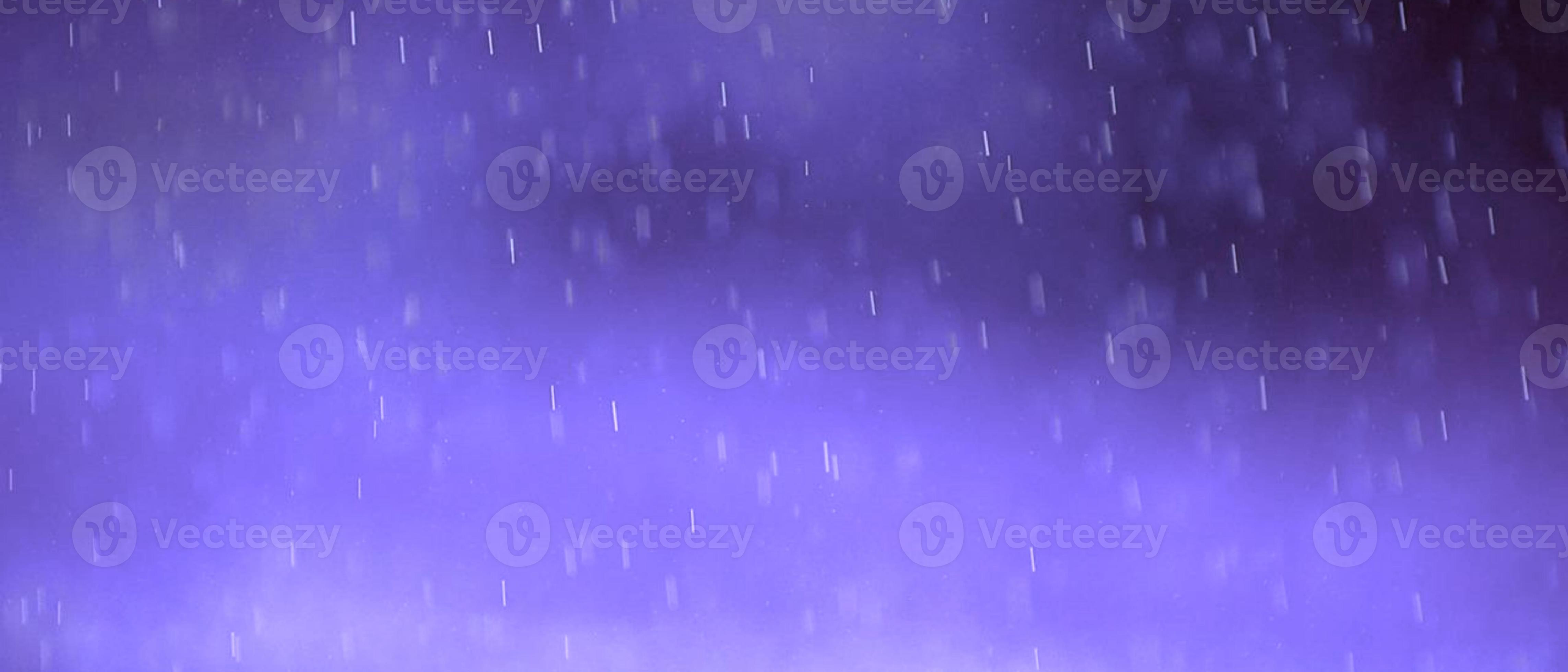 A purple background with rain drops - Computer