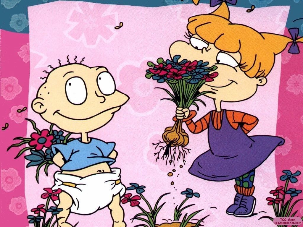 A cartoon of two children holding flowers - Rugrats