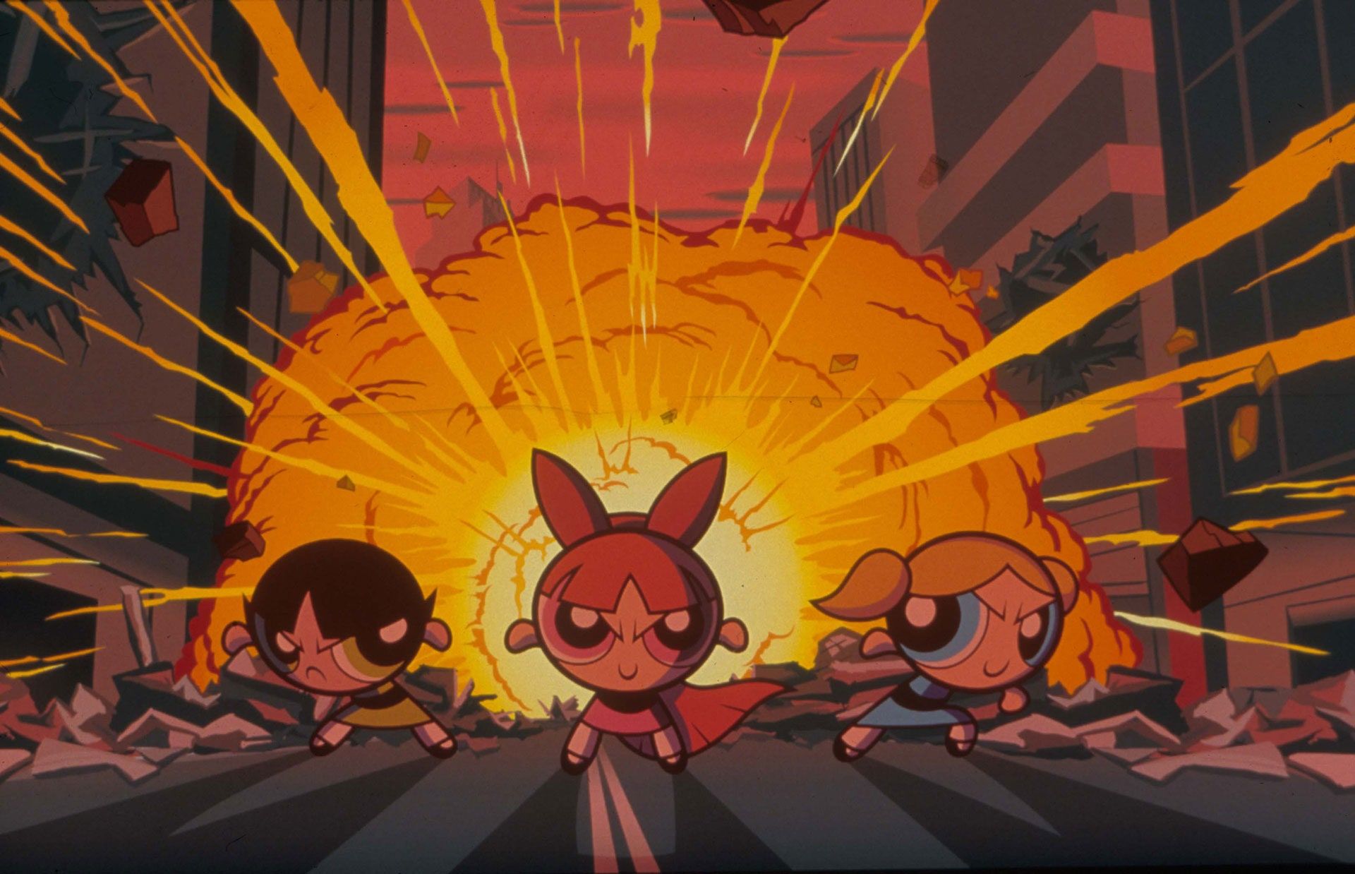 A cartoon of three girls standing in front - The Powerpuff Girls