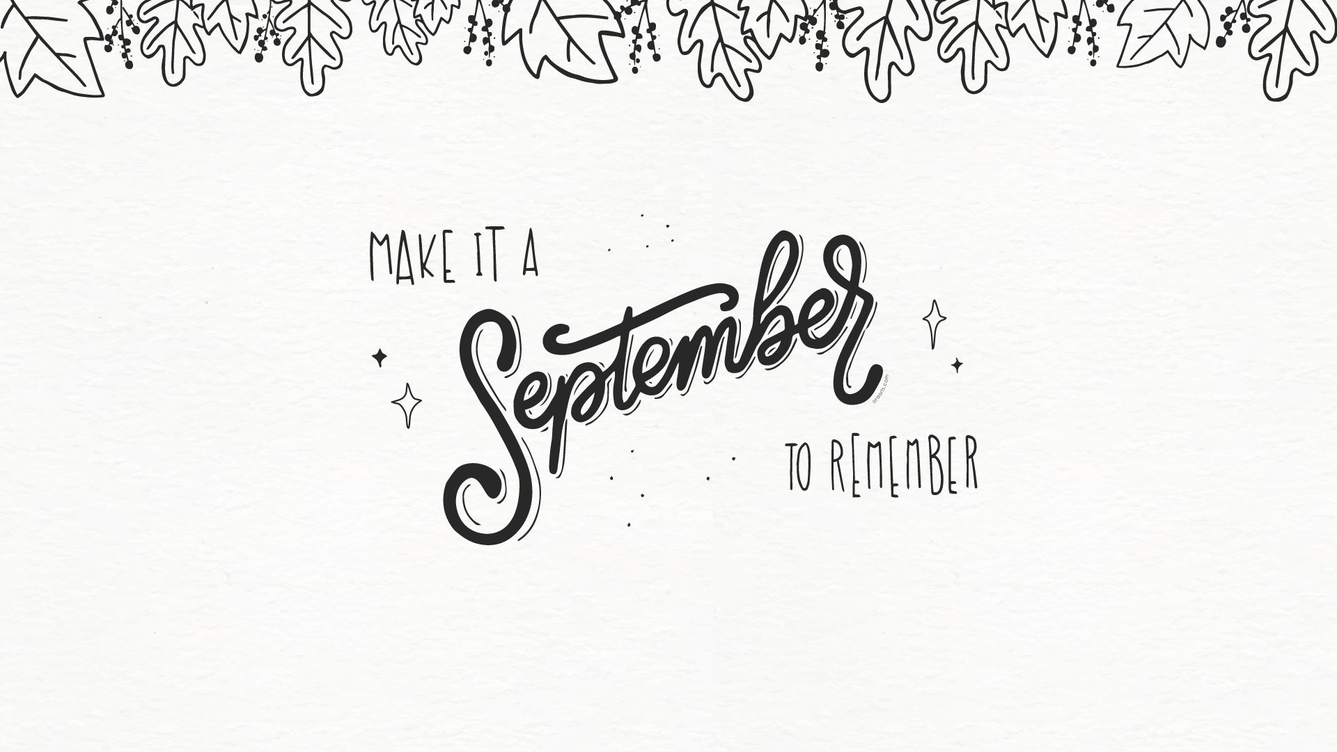 A handwritten quote on white paper that says make it september - September