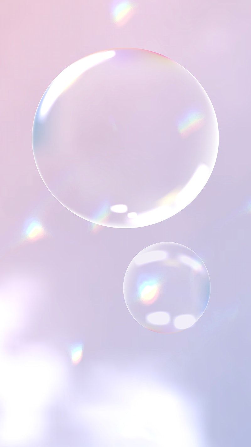Bubble soap with rainbow reflection on a pink background - Bubbles