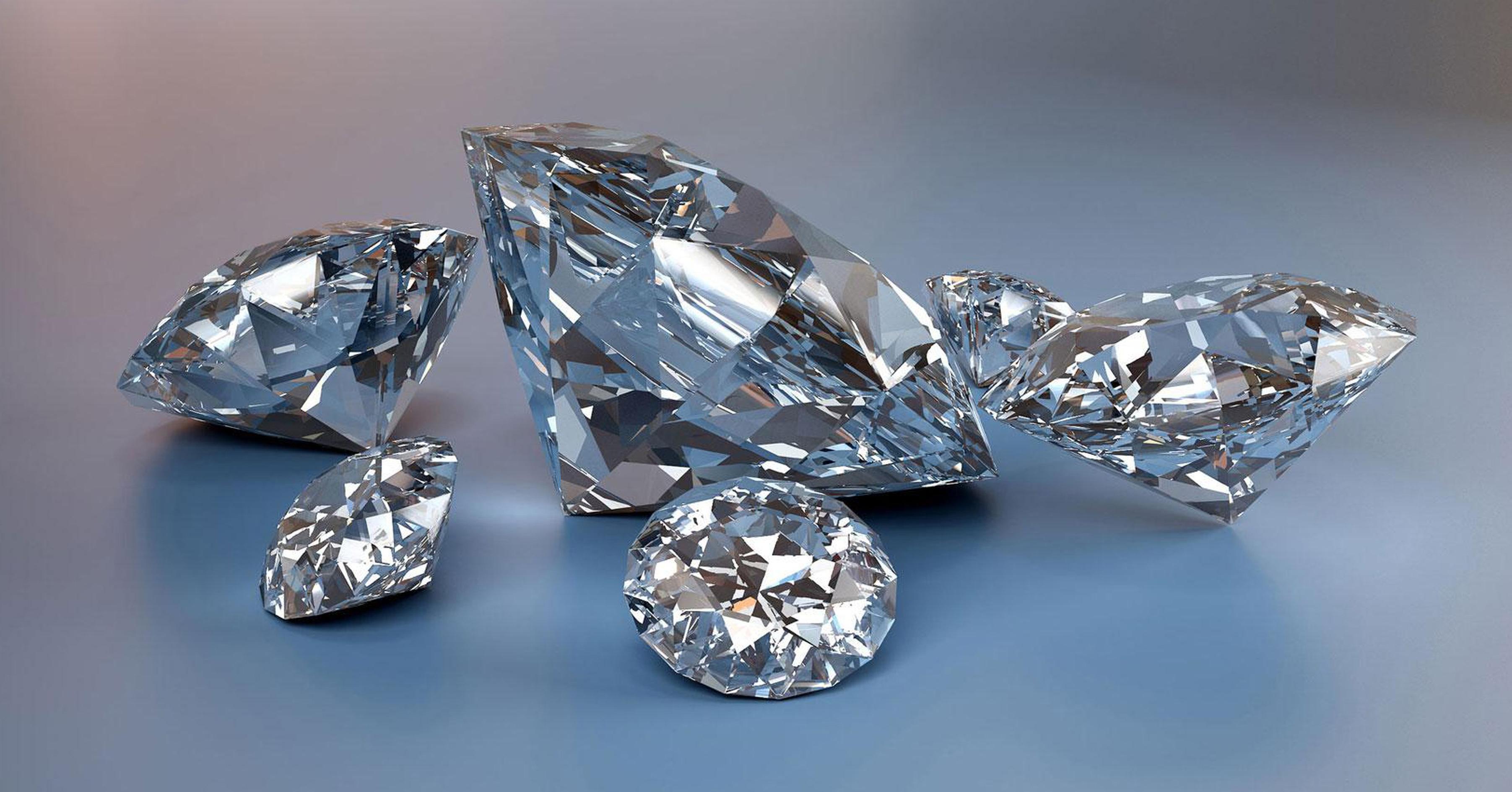 A group of diamonds on blue background - Diamond