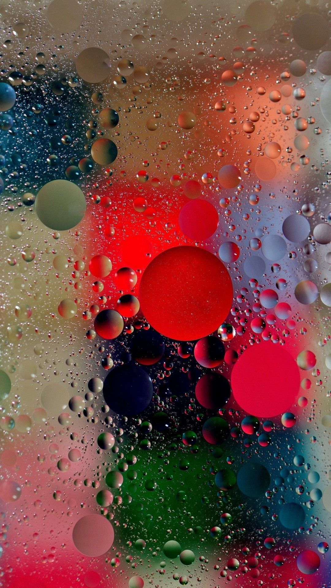 A close up of water droplets on glass - Bubbles