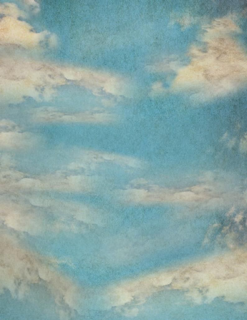 A vintage image of a blue sky with clouds. - Vintage clouds