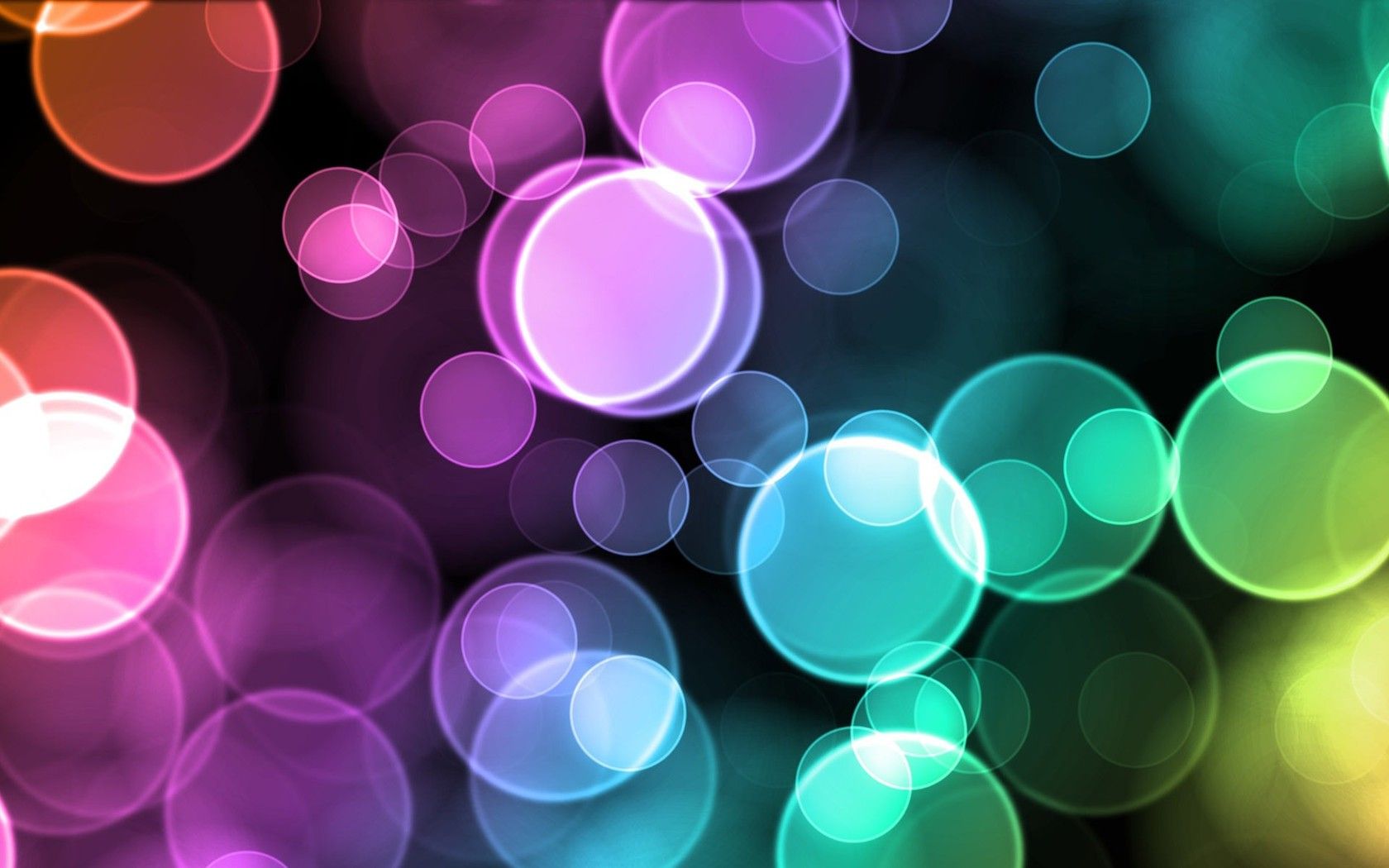 Colorful bokeh lights on a black background - Bubbles