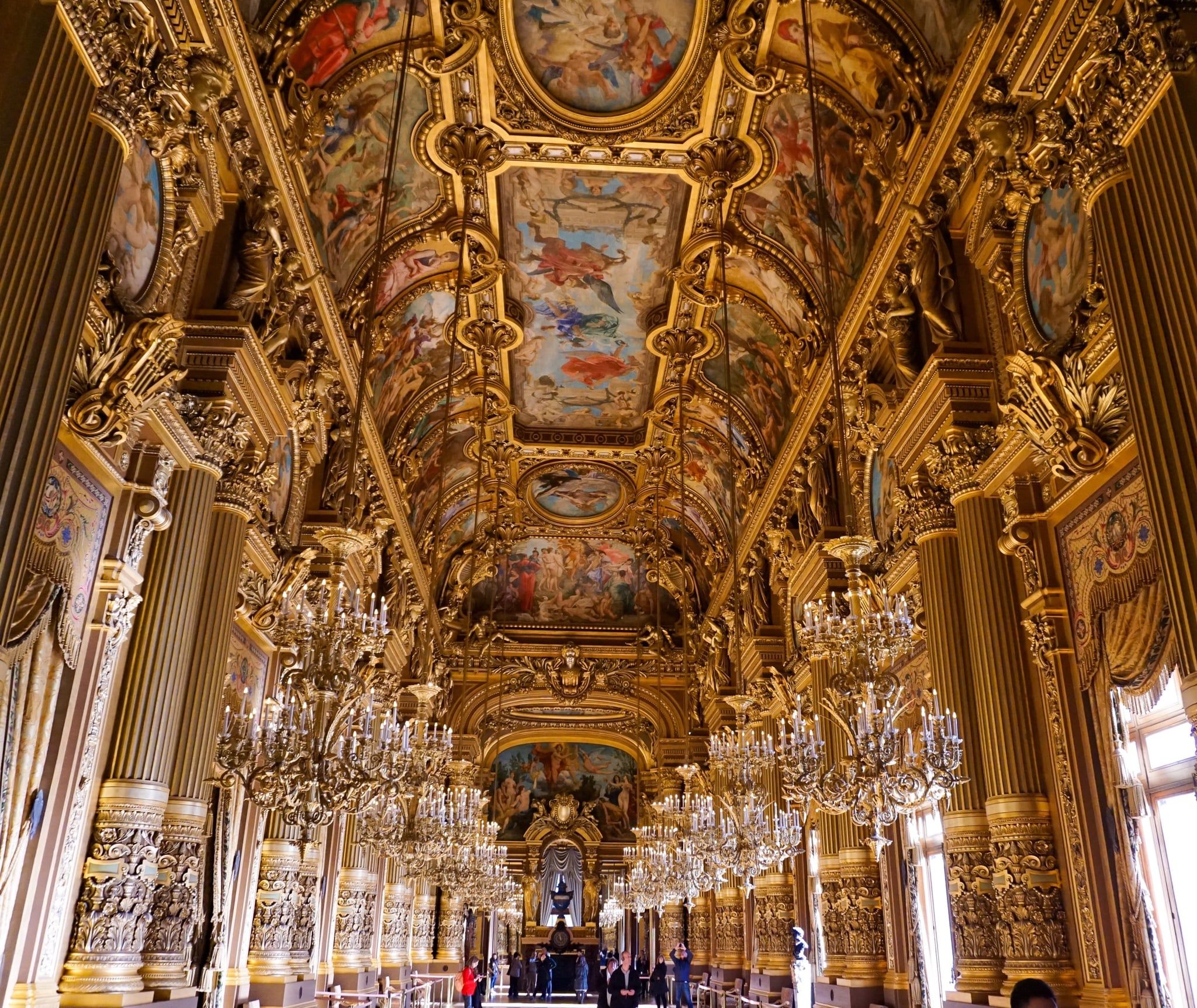 The inside of the Opera Garnier in Paris, with ornate gold and blue ceiling and chandeliers. - Castle, royalcore