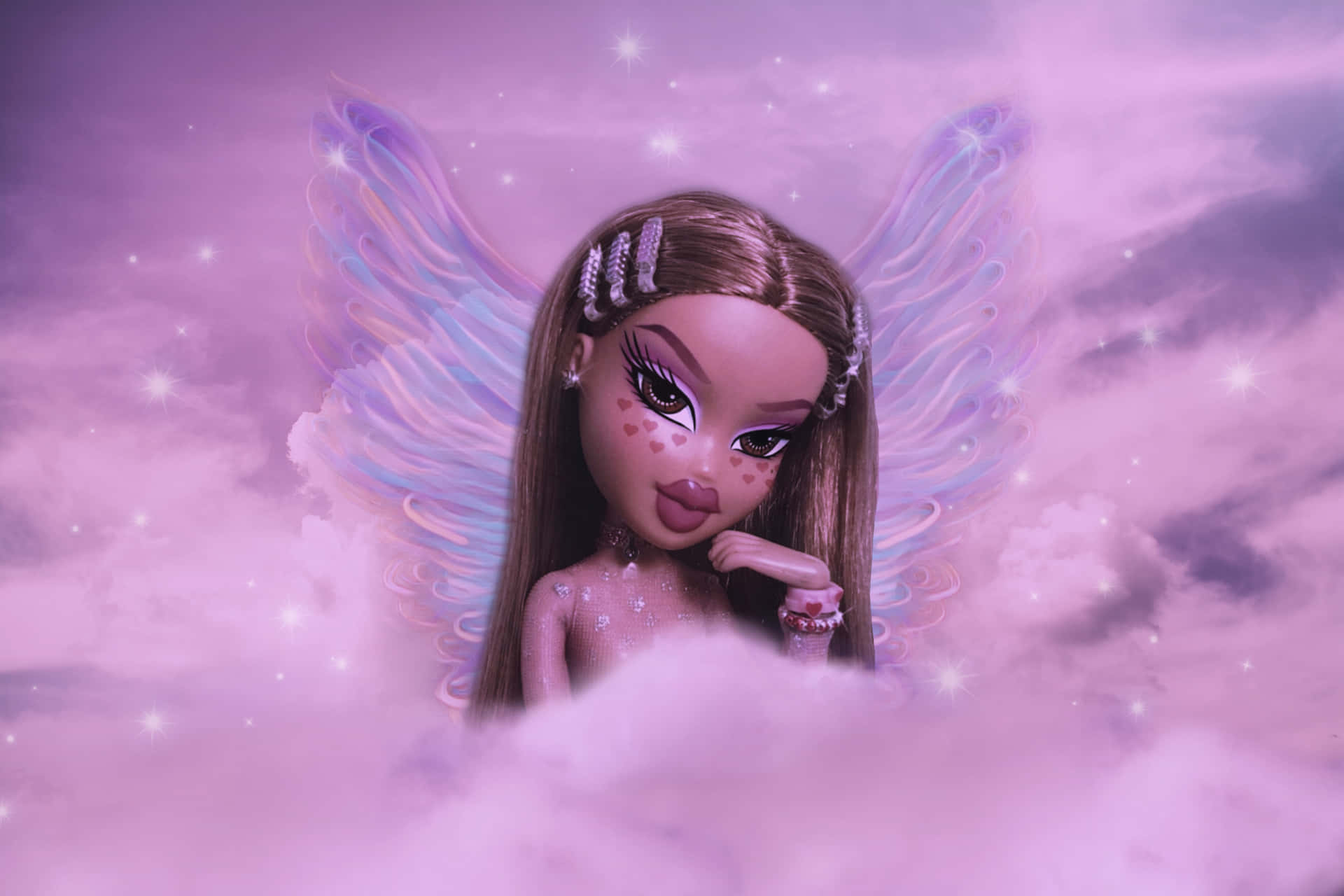 A doll with wings and sparkles on her face. - Bratz