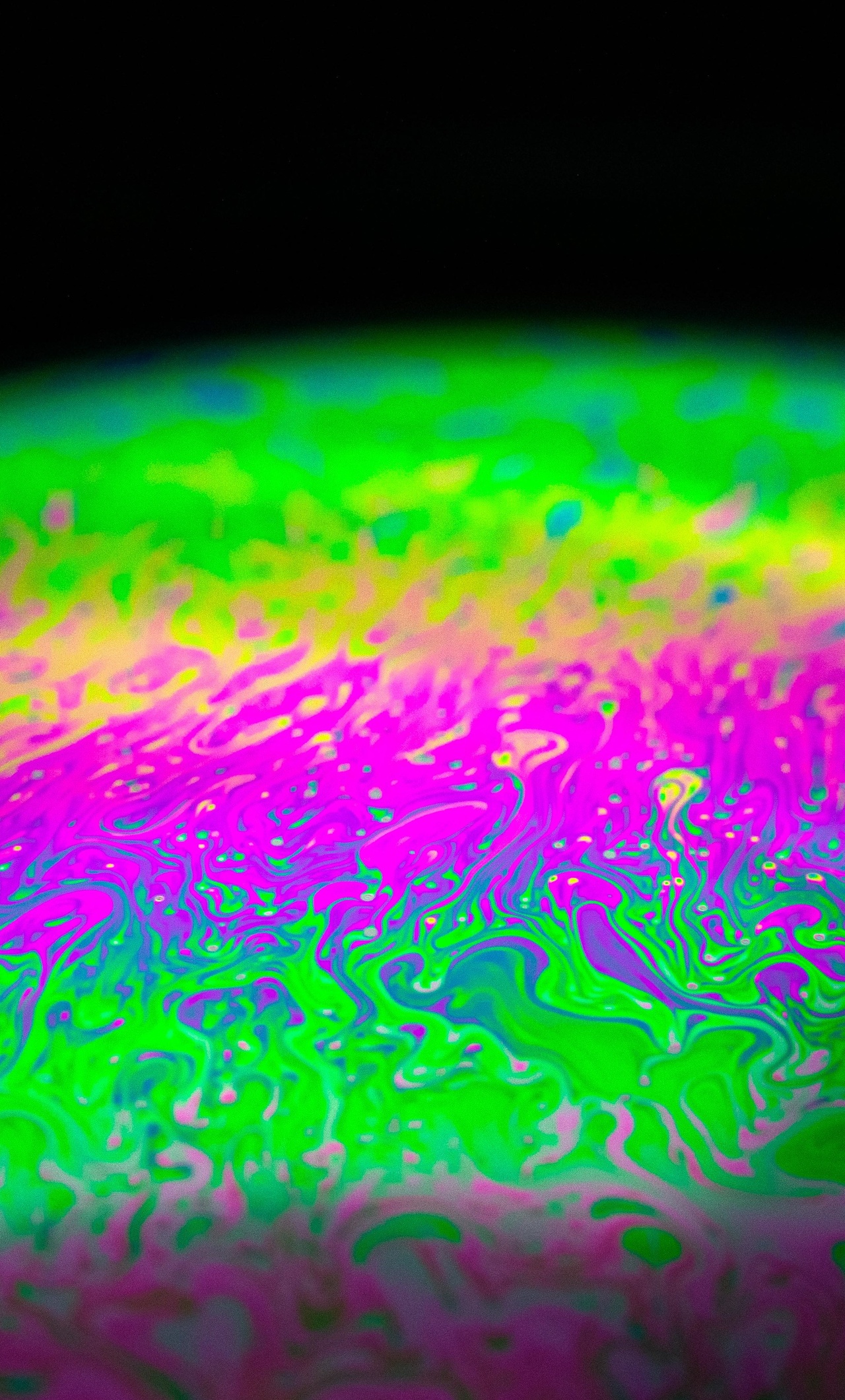 A close up of some colorful paint - Bubbles