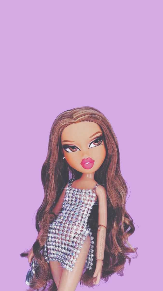 A doll with long hair and silver dress - Bratz
