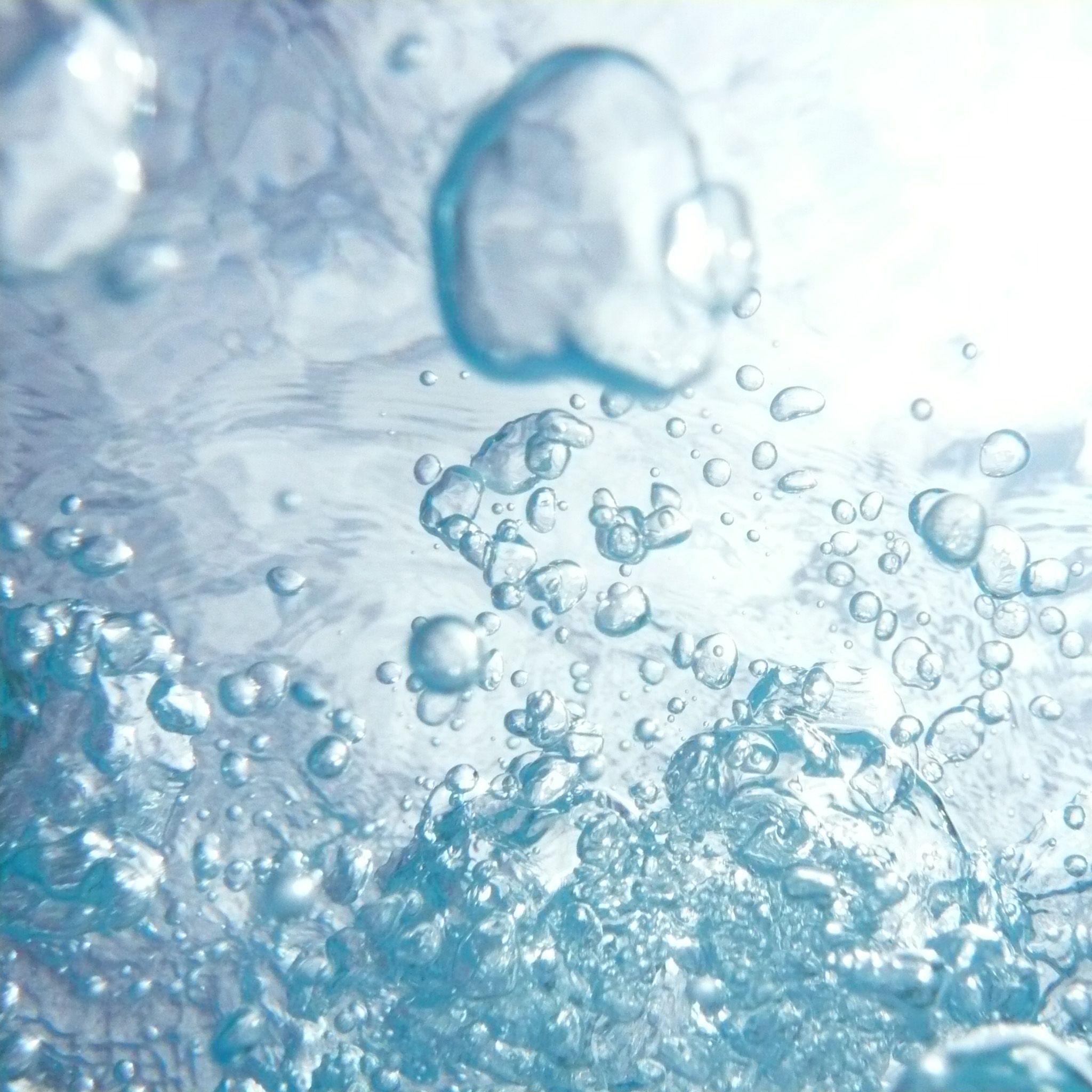 A close up of water bubbles in a tub - Bubbles