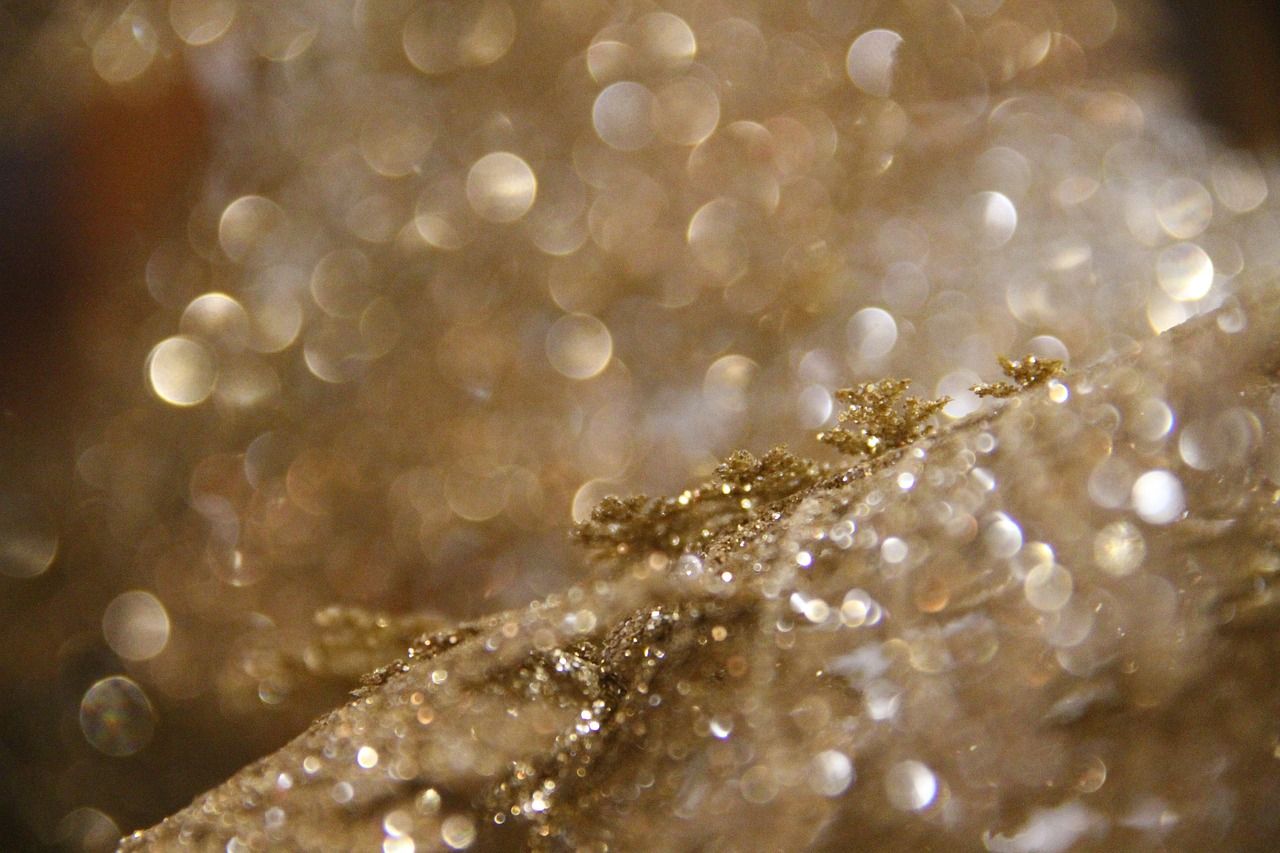A close up of some glitter on top - Champagne