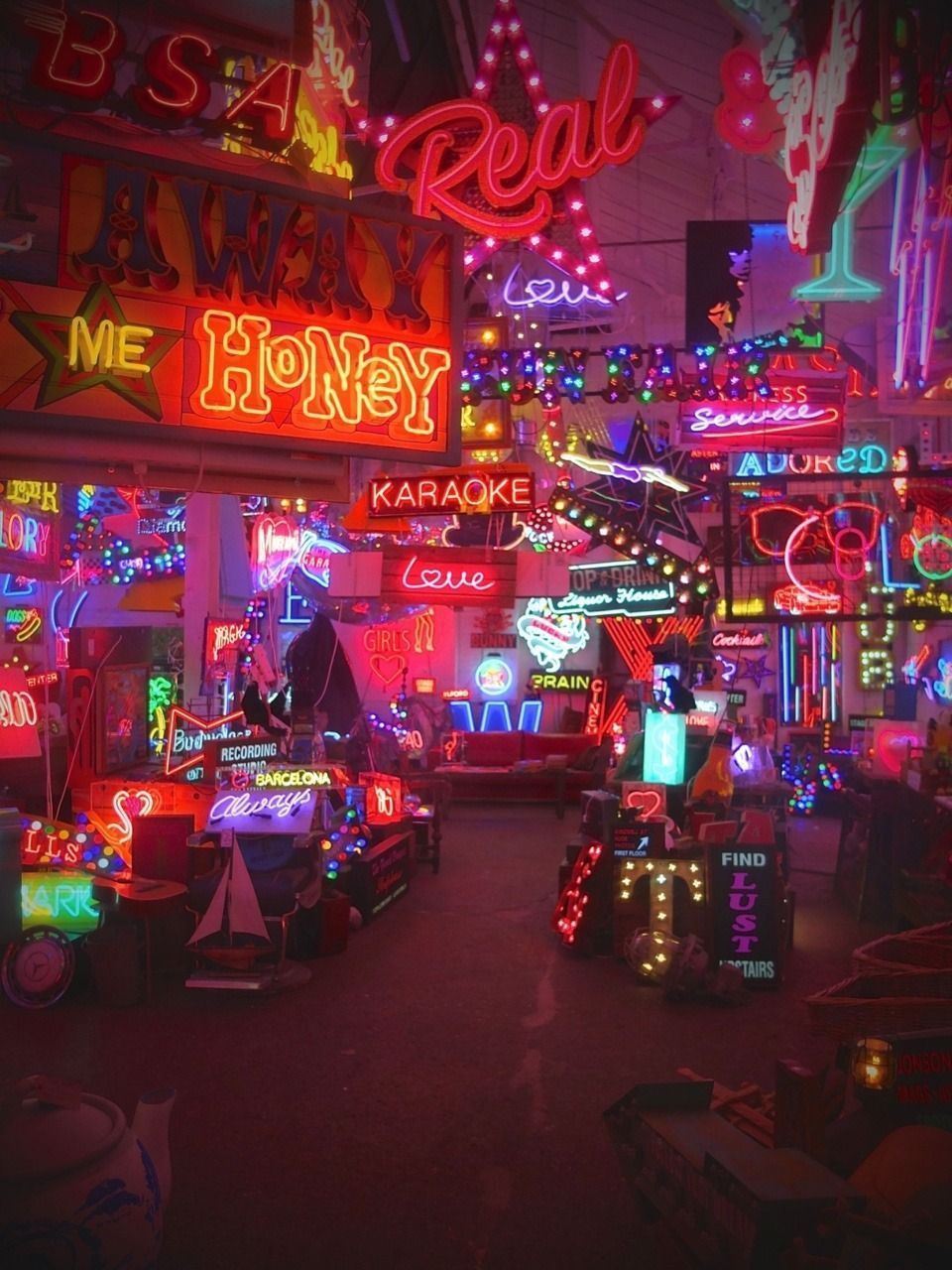A room filled with a variety of different colored neon signs. - Las Vegas