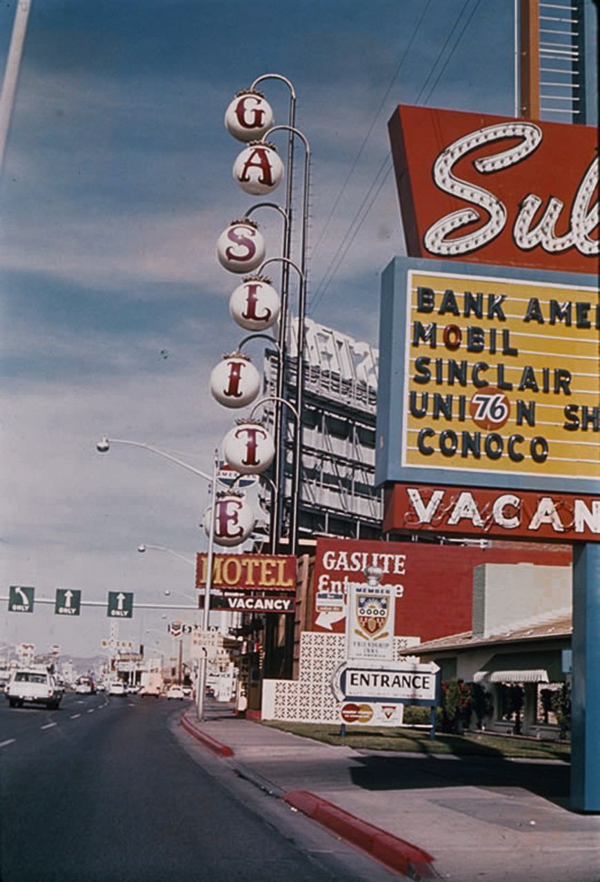 A street scene with many signs and buildings - Las Vegas