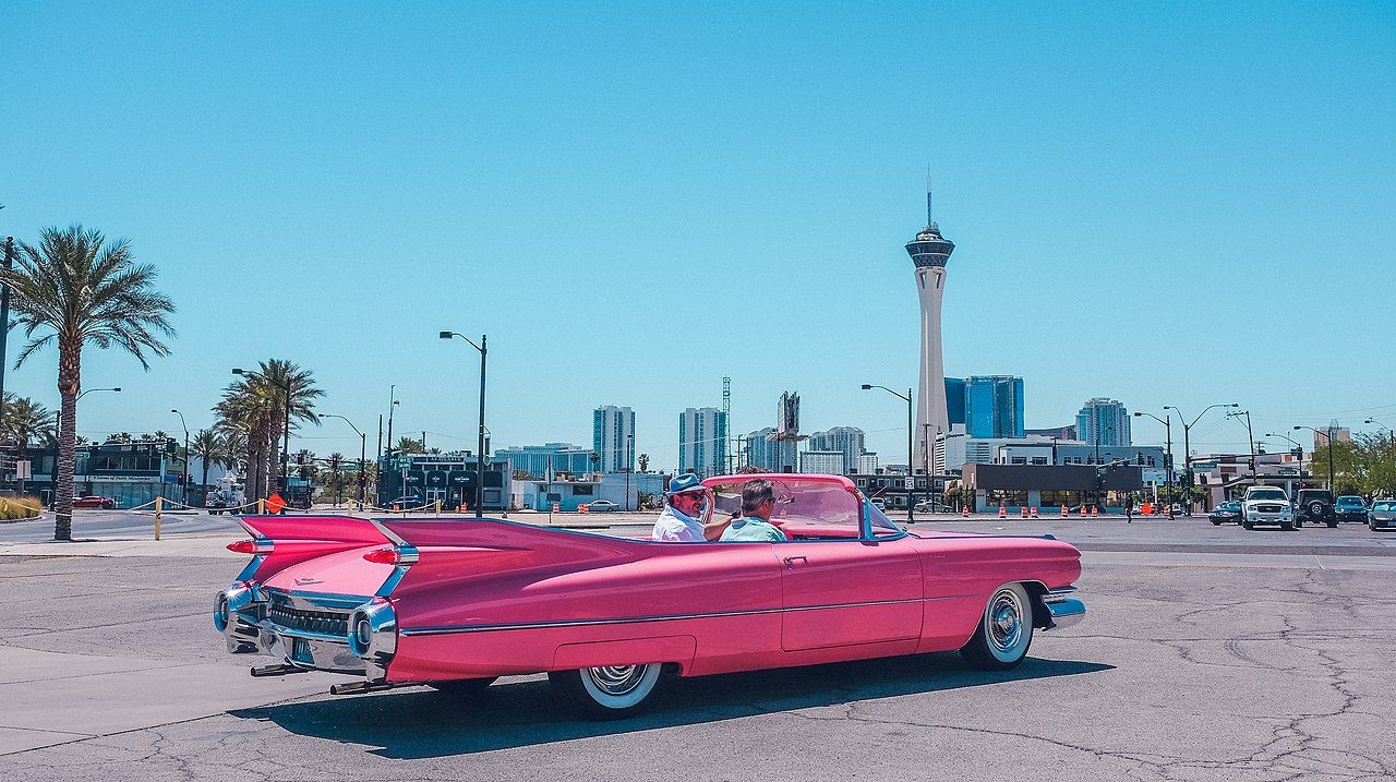 A pink car is parked on the street - Las Vegas