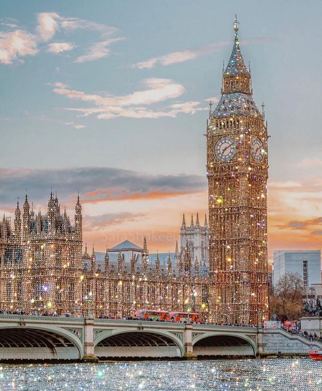 The big ben clock tower is lit up at night - London