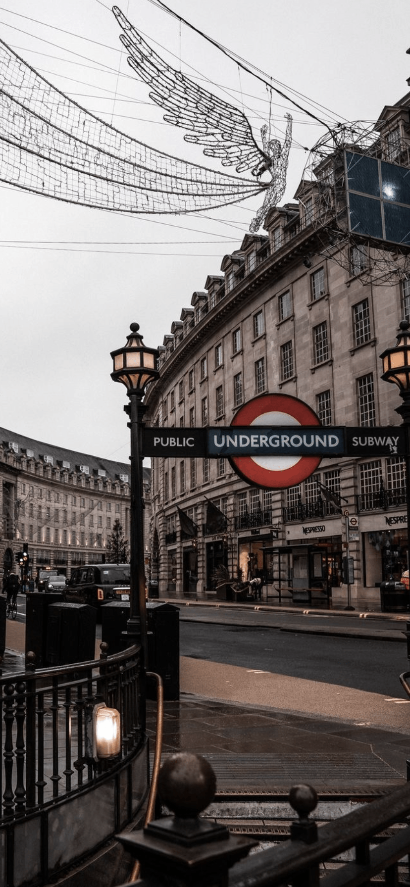 A street sign for the public underground in a city. - London