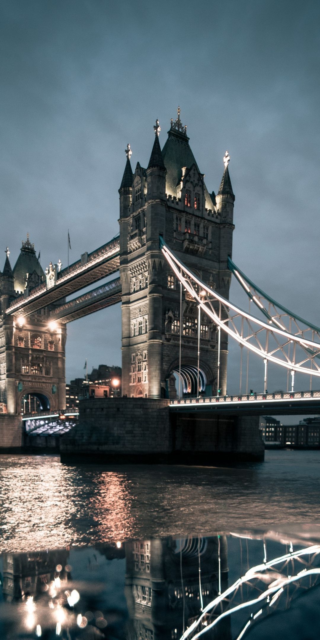 A bridge over water at night - London