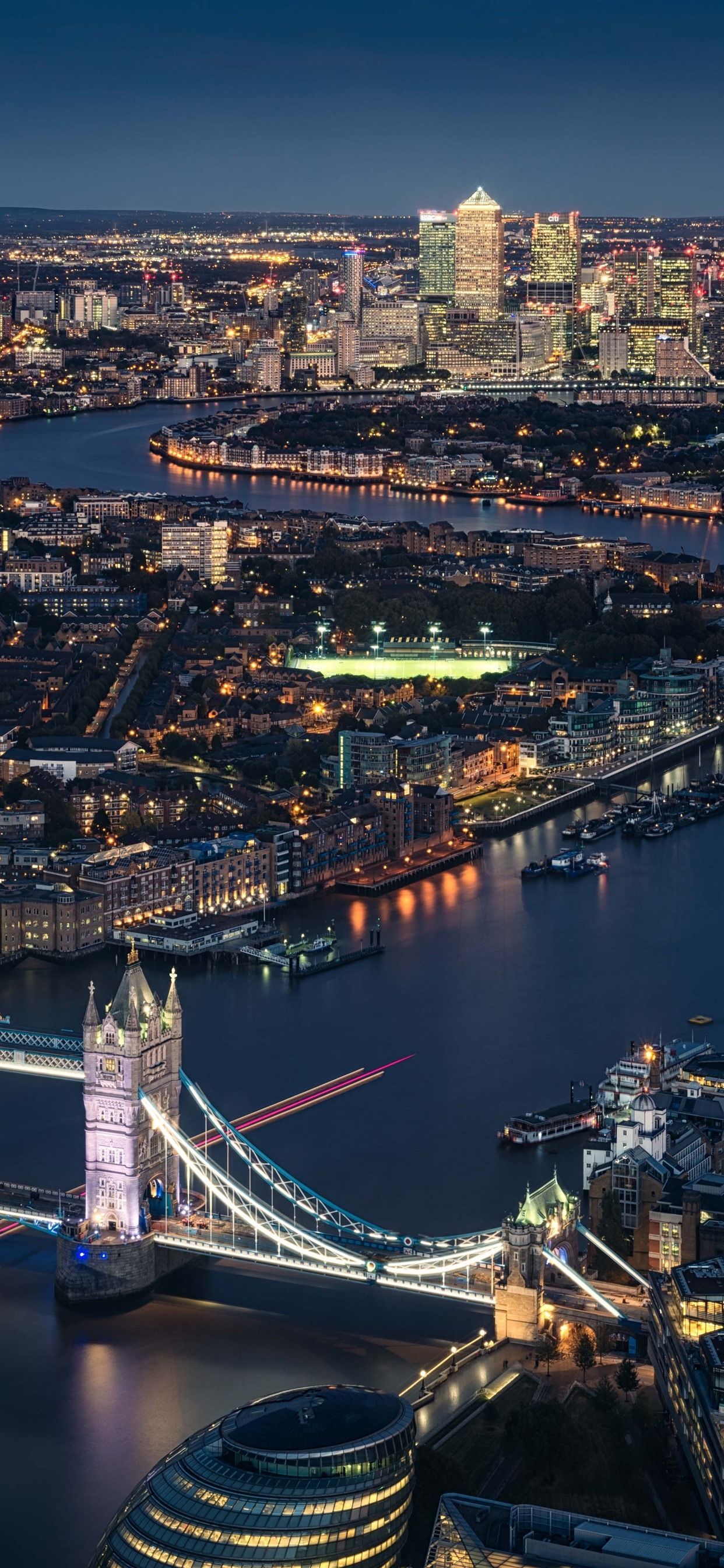 A city at night with many bridges - London