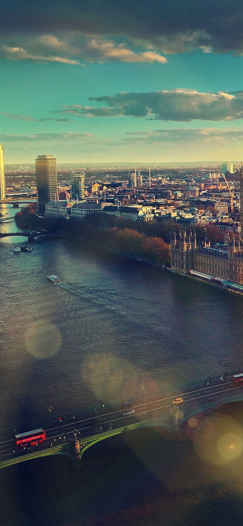 A city with water and buildings in the background - London