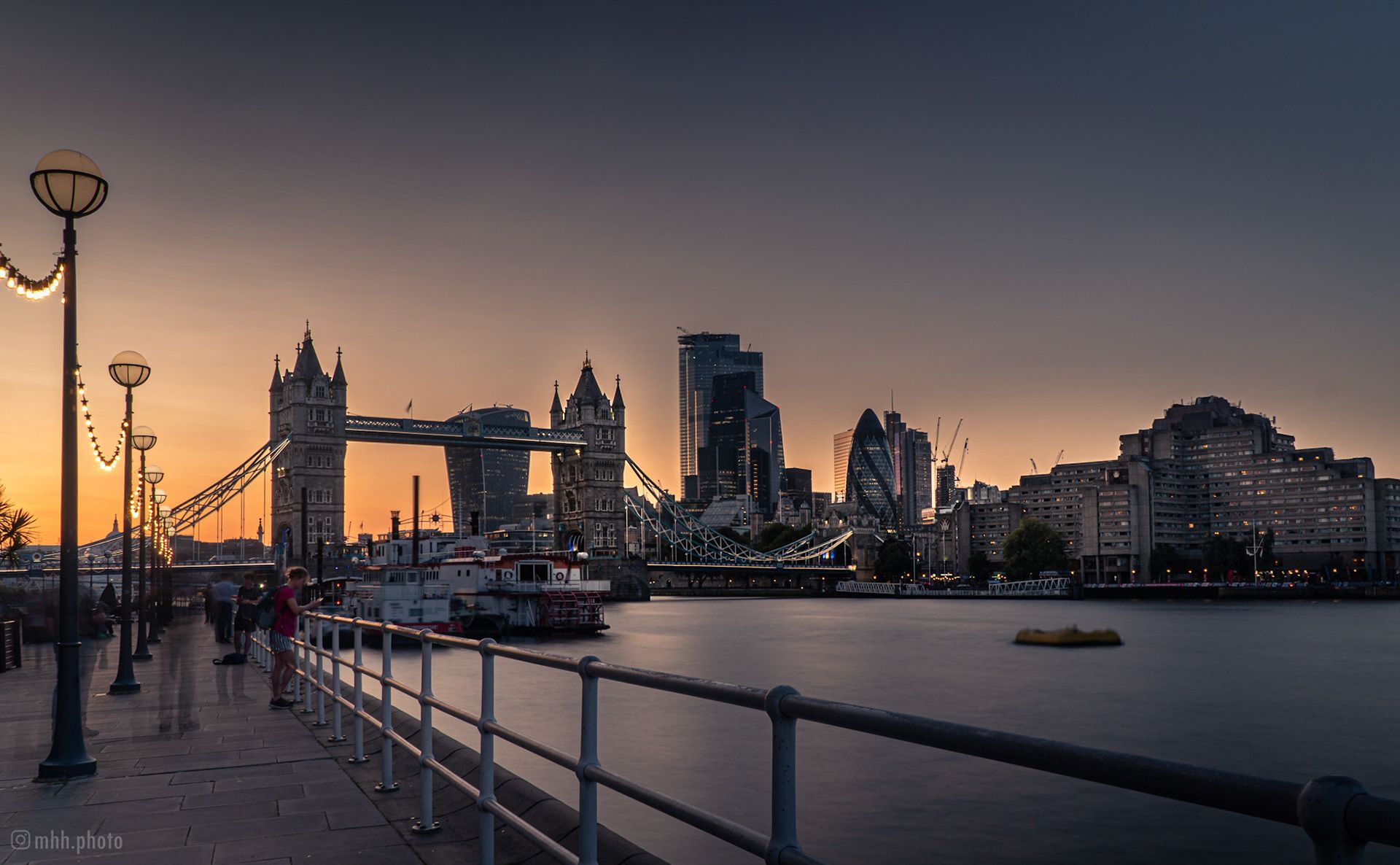 A sunset view of Tower Bridge and the City of London - London