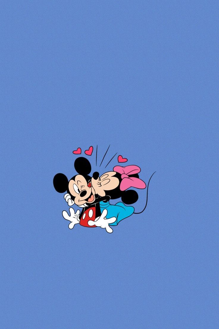 A cartoon of mickey and minnie mouse - Minnie Mouse
