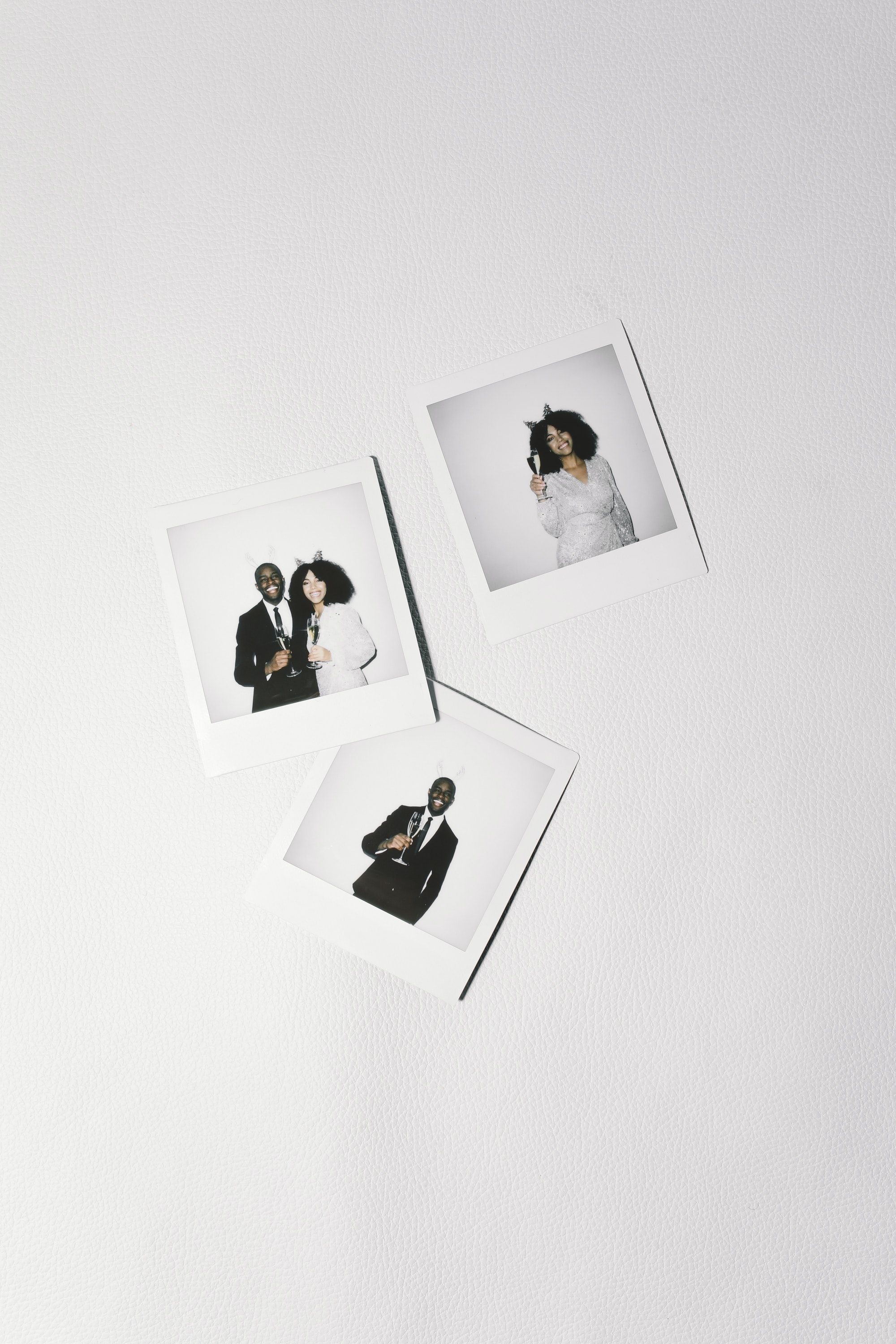 Three polaroid pictures of a couple in various poses. - Polaroid