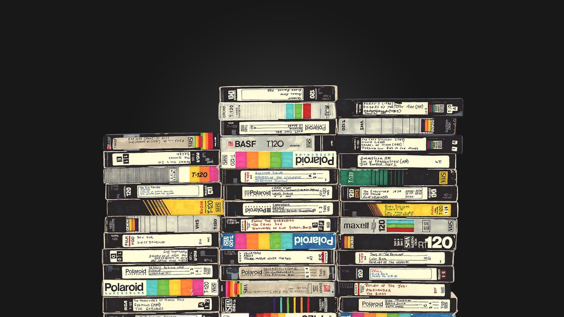 A stack of VHS tapes on a black background - Polaroid