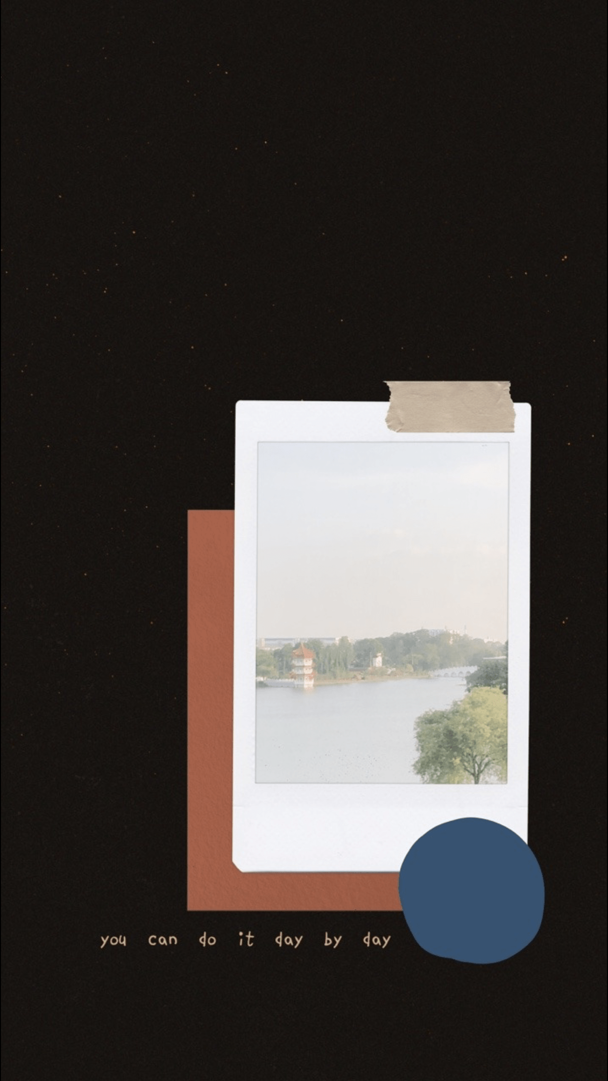 A polaroid picture of a body of water is taped to a black background. - Polaroid