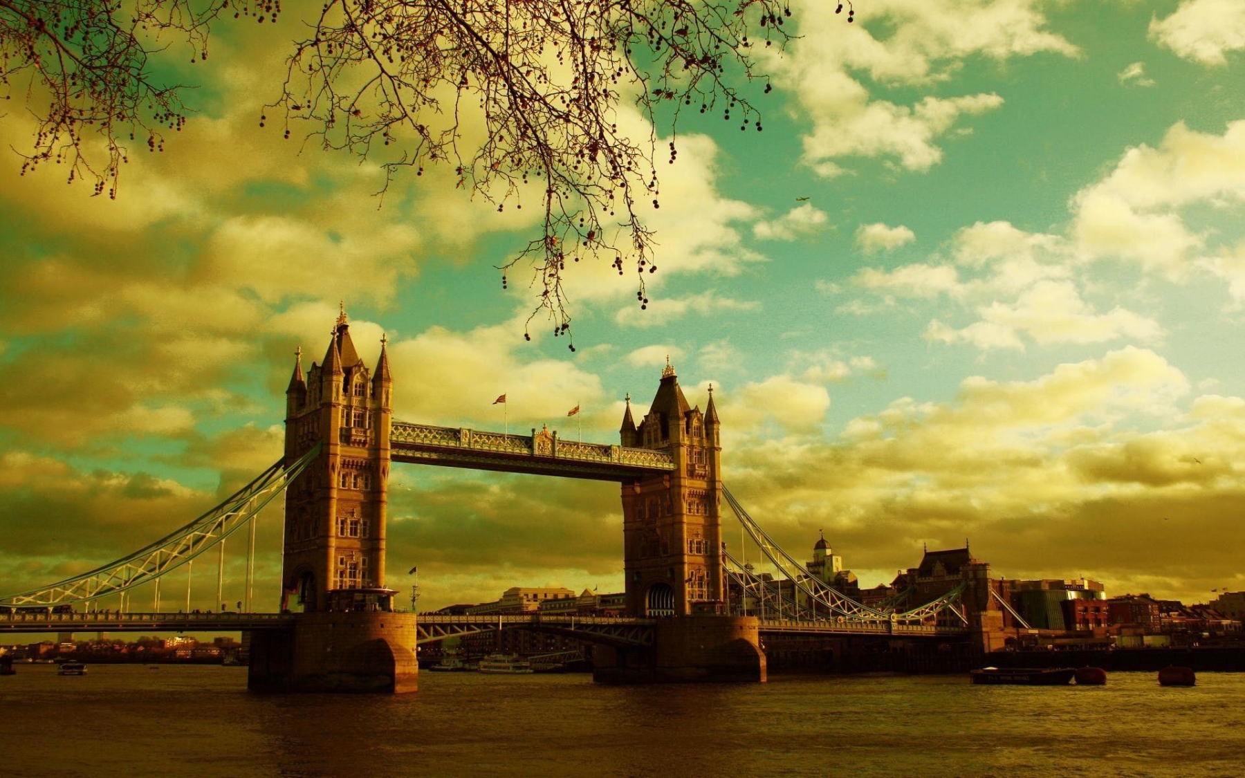 A bridge over the water with clouds in background - London