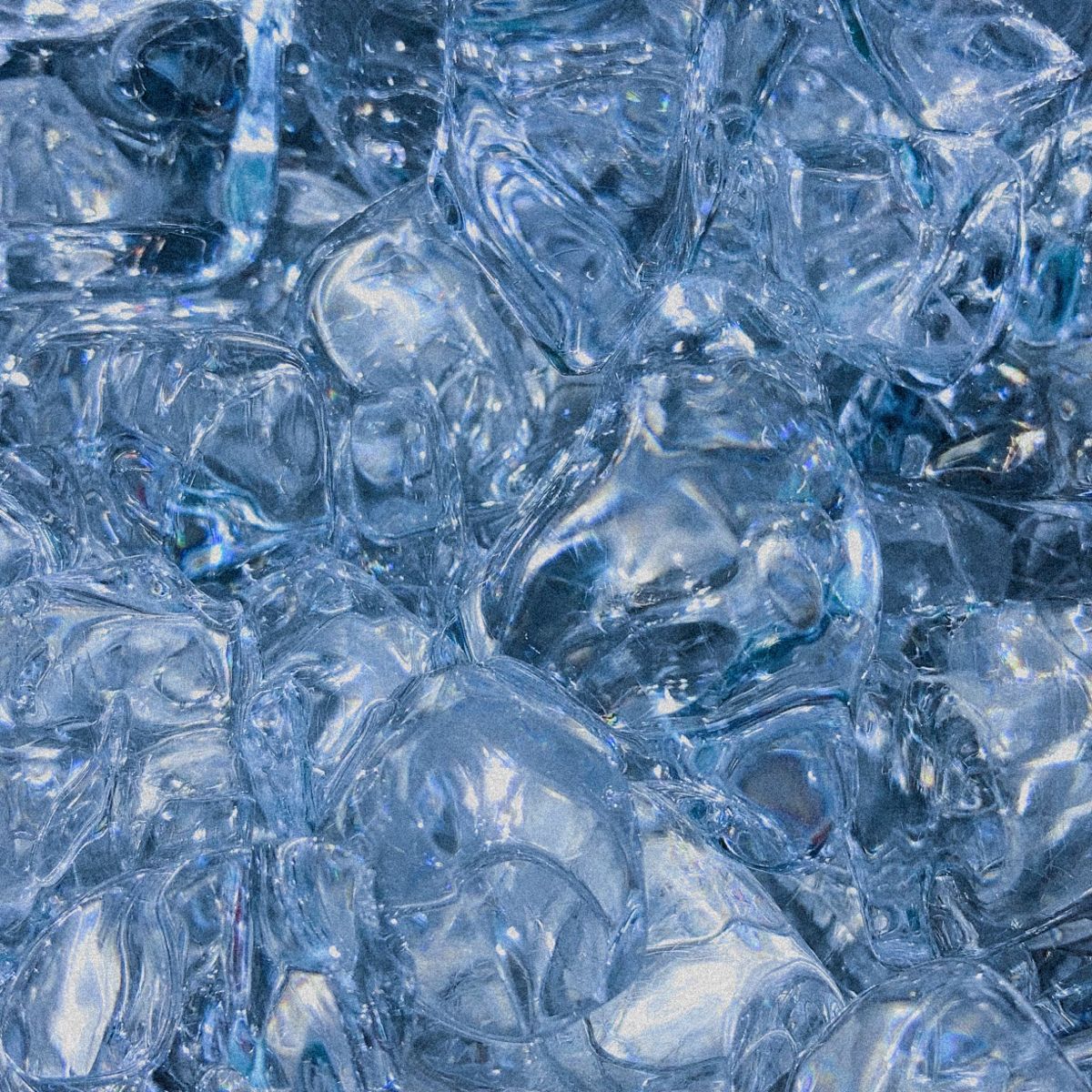 A close up of ice cubes in water - Ice
