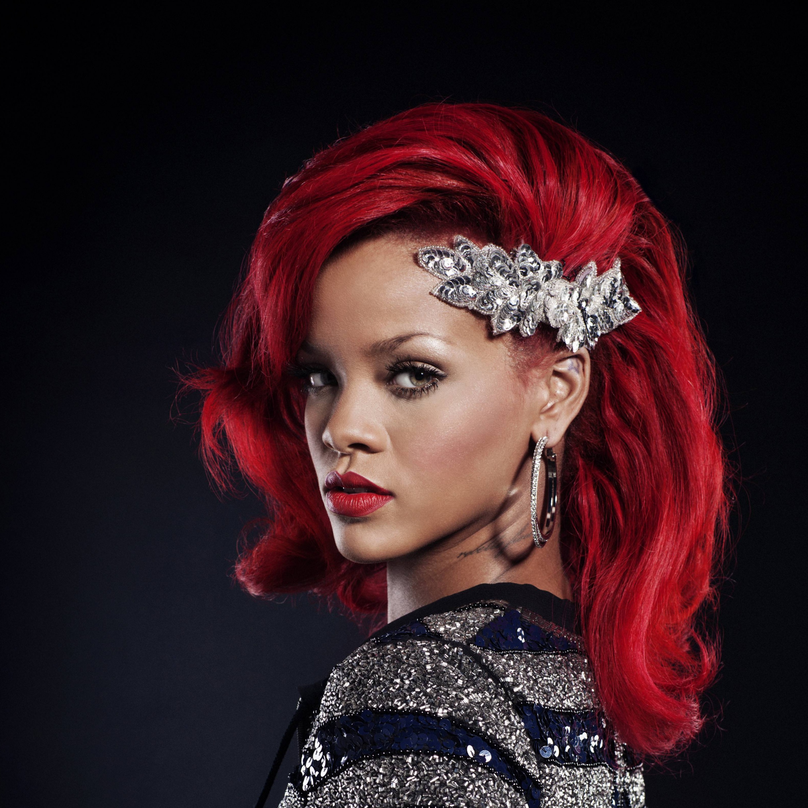 Rihanna with red hair and a diamond hair clip - Rihanna