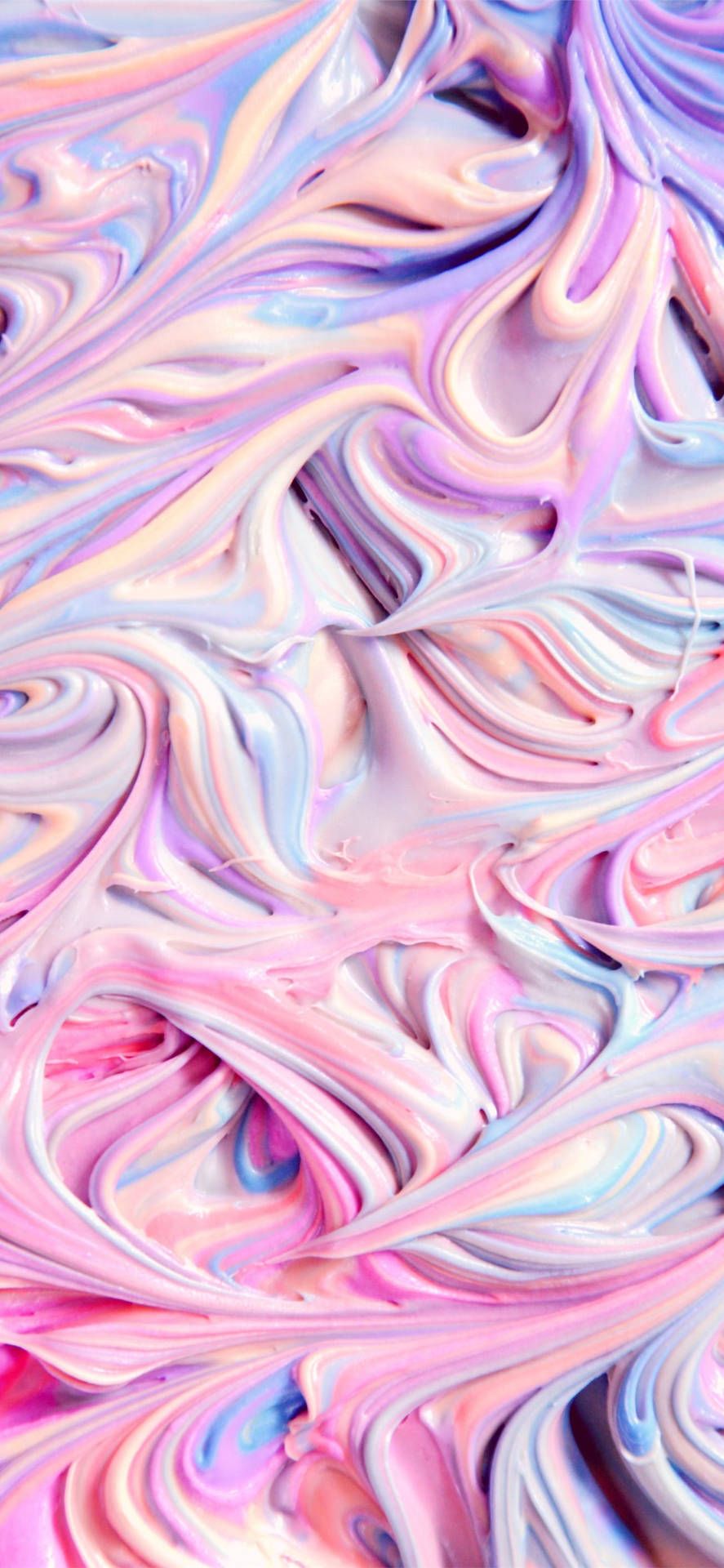 A close up of pink, blue and purple swirled together - Slime