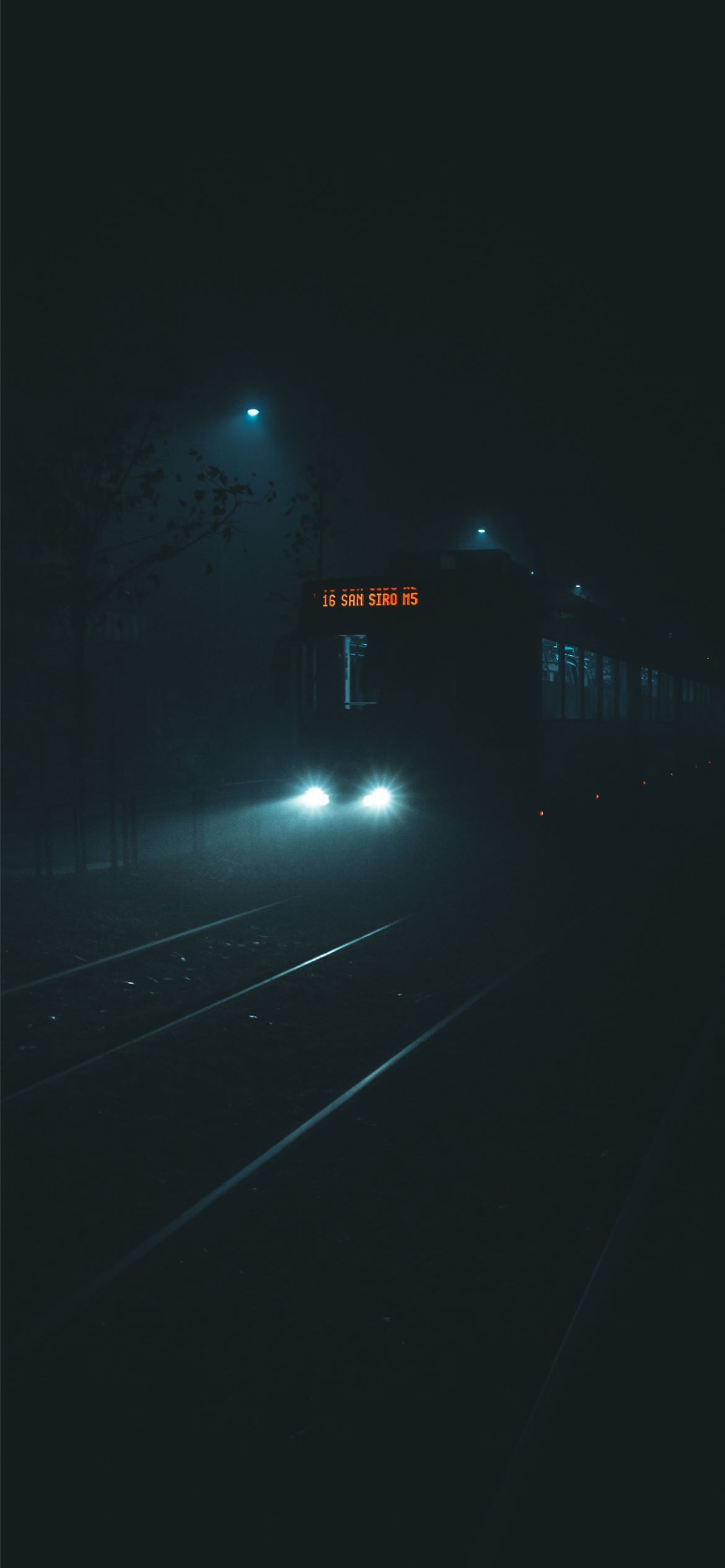 A bus and car with headlights on in the dark - Road, depressing, sad