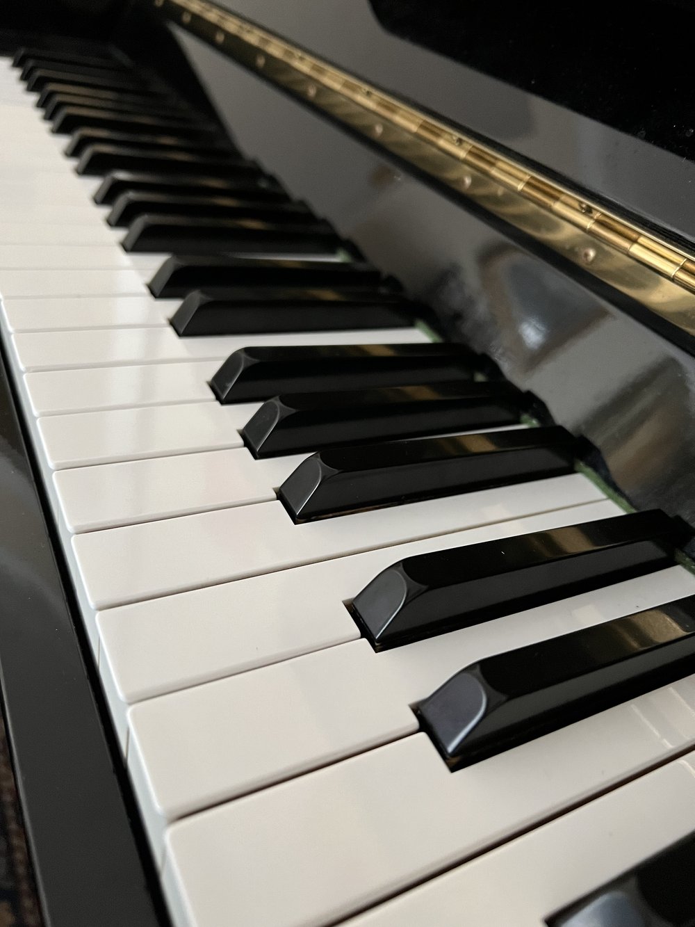 A close up of an electronic piano - Piano
