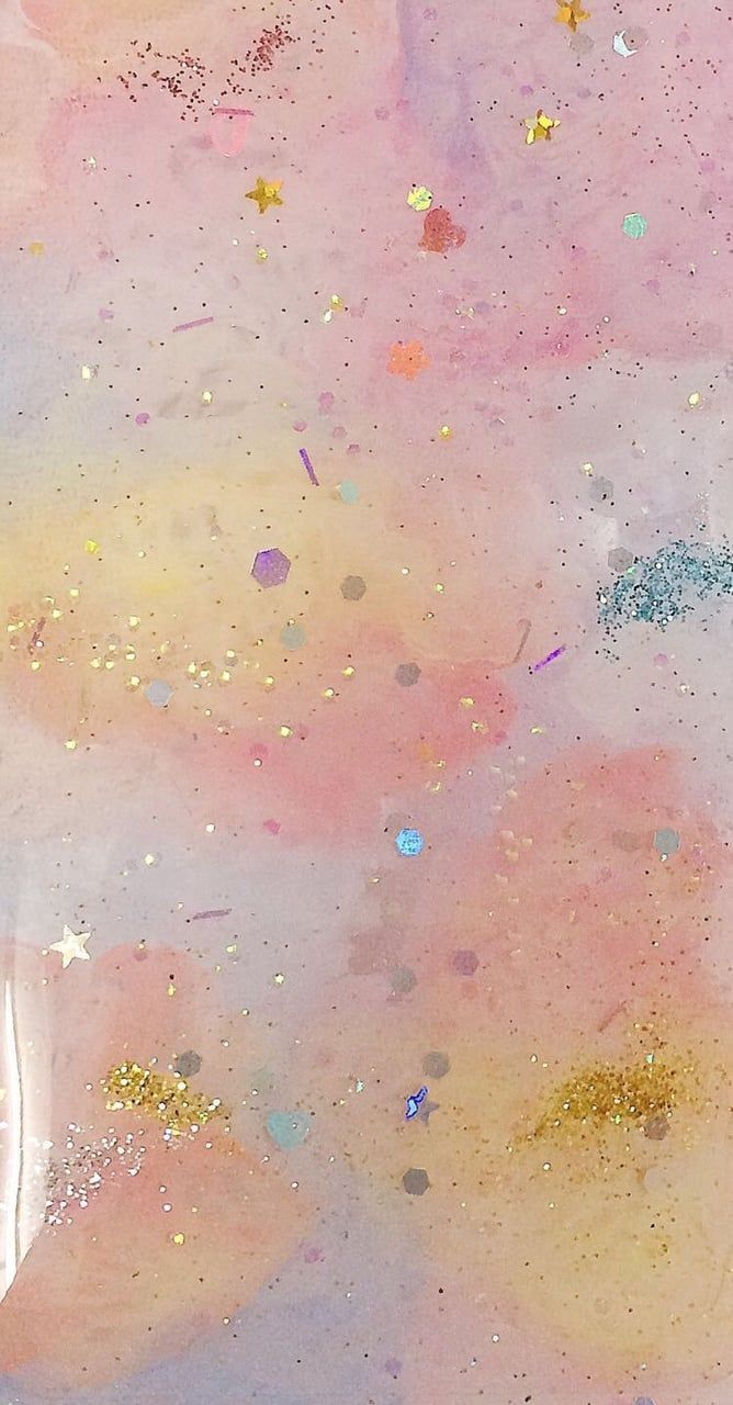 A close up of some pink and gold glitter - Slime